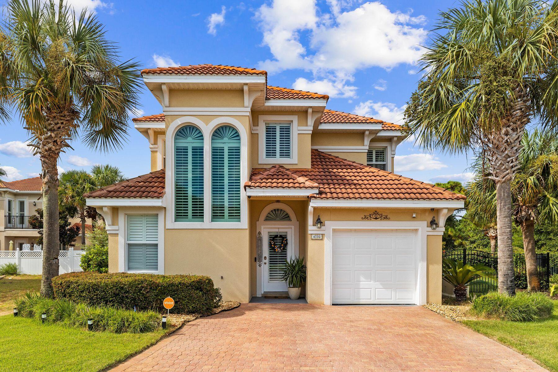 Welcome to gated Calusa Bay and this exquisite 3-bedroom, 2.5-bathroom home with a bonus office located in the heart of Destin. With a whole house Generac generator, you can be worry-free when it comes to weather. This beautifully maintained residence offers the perfect blend of luxury, comfort and convenience, making it an ideal choice for those seeking a refined coastal lifestyle. Step inside to discover a thoughtfully designed interior with high-end finishes and modern touches. The main living area features a cozy gas fireplace, while the kitchen offers gas appliances, including a new Bosch dishwasher, kitchen sink and garbage disposal. The master suite is a tranquil retreat with a spacious tile shower with seat and two shower heads, a double vanity and a separate water closet. The second floor offers a charming sunroom off the second bedroom, perfect for enjoying morning coffee or an evening read and can serve as an office, media room or play area. The private backyard and patio provide an ideal space for outdoor entertaining, featuring a new paver patio and a SunSetter awning for shade. There is plenty of room for children and fur babies to play as well. Other recent improvements include new plantation shutters, two remodeled baths that exude luxury and a modern style. The home also offers a Vivint prewired security system with cameras, two wall-mounted TV's, a newly pressure-washed and sealed driveway and new HVAC and upper zone ductwork. The generous pie-shaped lot with fenced yard is complemented by lush landscaping, enhancing its curb appeal and providing a serene environment. Residents of rental-restricted Calusa Bay enjoy access to a community pool and the peace of mind that comes with living in a gated community. With an attached garage, this home offers both practicality and elegance. Centrally located near Destin Commons, pristine beaches, top-tier restaurants and world-class shopping and golfing, this home is perfectly positioned to enjoy all Destin offers.