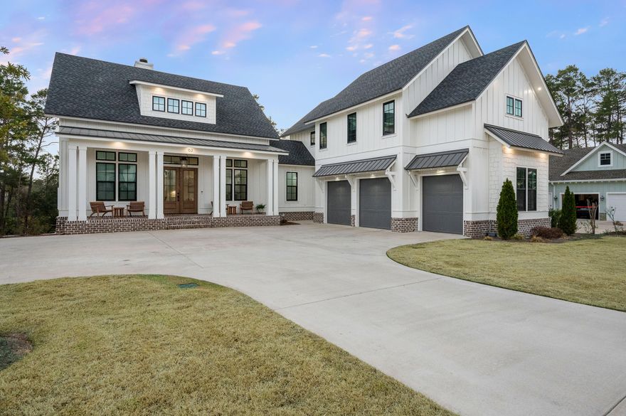 The only three-story home in Deer Moss Creek with a private in-law residence and separate entrance, 153 Caraway Drive offers a rare opportunity for luxury multi-generational living in one of Niceville's most sought-after communities.Built in 2024, this exceptional 3,822-square-foot, 4-bedroom, 3.5-bath luxury estate was thoughtfully designed to provide both connection and privacy across three levels of beautifully appointed living space.From the moment you arrive, the oversized parking area and architectural presence set the tone for what lies within. Step inside and you are welcomed by 12-foot ceilings, engineered hardwood floors, and a stunning gas fireplace that anchors the open main living space. Thoughtfully designed for both everyday living and entertaining, the chef's kitchen showcases granite countertops, custom cabinetry, tile backsplash, a large gathering island, integrated Thermador refrigerator, and Z-Line gas cooktop.

The main-level primary suite offers a spa-inspired retreat, complete with quartz countertops, double vanities, a massive tiled walk-in shower, custom closet, and elegant nickel gap wall paneling that adds warmth and architectural character. Remote-controlled blinds are installed in the bedrooms, providing both convenience and comfort.

Step outside to the screened-in Trex deck off the dining area, where peaceful views of the natural preserve and nature trails create the perfect setting for morning coffee or evening gatherings.

The lower level was designed for both relaxation and entertaining, featuring a spacious secondary living area and a dedicated movie theater room with theater seating that conveys with the home. The theater space features its own Sonos sound system, delivering an immersive cinematic experience. Two additional bedrooms and a full bath provide comfortable accommodations, while French doors lead to the covered patio and backyard that backs to Deer Moss Creek's scenic nature trails and preserved green space. The yard offers plenty of room to design a future pool and outdoor retreat. This level also includes a gym area, extensive storage, and a poured concrete safe room.

The top floor offers a completely private executive-level in-law suite, including its own entrance, full kitchen with granite countertops, spacious living area, bedroom, bonus room, laundry, and a covered Trex balcony overlooking the nature trails and preserved natural area. This level creates unmatched flexibility for extended living arrangements or long-term guests.

Designed with comfort and privacy in mind, the home includes spray foam soundproofing between each floor and a whole-house Sonos sound system, allowing music to flow throughout the home while the theater room maintains its own dedicated audio experience.

Additional premium features include:
" Whole-house Sonos music system
" Dedicated theater room sound system with theater seating included
" Three independent HVAC systems
" Commercial Generac whole-house generator
" Granite countertops in kitchens and baths
" Quartz countertops in the primary suite
" Engineered hardwood flooring and tile baths
" Remote-controlled blinds in the bedrooms
" Extra interior garage storage
" Oversized parking area

Deer Moss Creek is known for its vibrant lifestyle and strong sense of community. Residents enjoy a neighborhood pool, clubhouse, more than five miles of paved nature trails, extra-wide sidewalks, and community events including food trucks, seasonal celebrations, and social gatherings throughout the year. The area is also known for its highly rated schools, making it a sought-after location for those who value education, community, and lifestyle. Niceville and Deer Moss Creek provide a wide range of amenities and experiences designed to suit every stage of life.

Located just minutes from Eglin Air Force Base, shopping, dining, and the Emerald Coast's beautiful beaches, this home offers the perfect balance of luxury, lifestyle, and convenience.

This is more than a home--it is a thoughtfully designed property that offers elevated living, privacy, and flexibility in one of Niceville's most desirable communities.