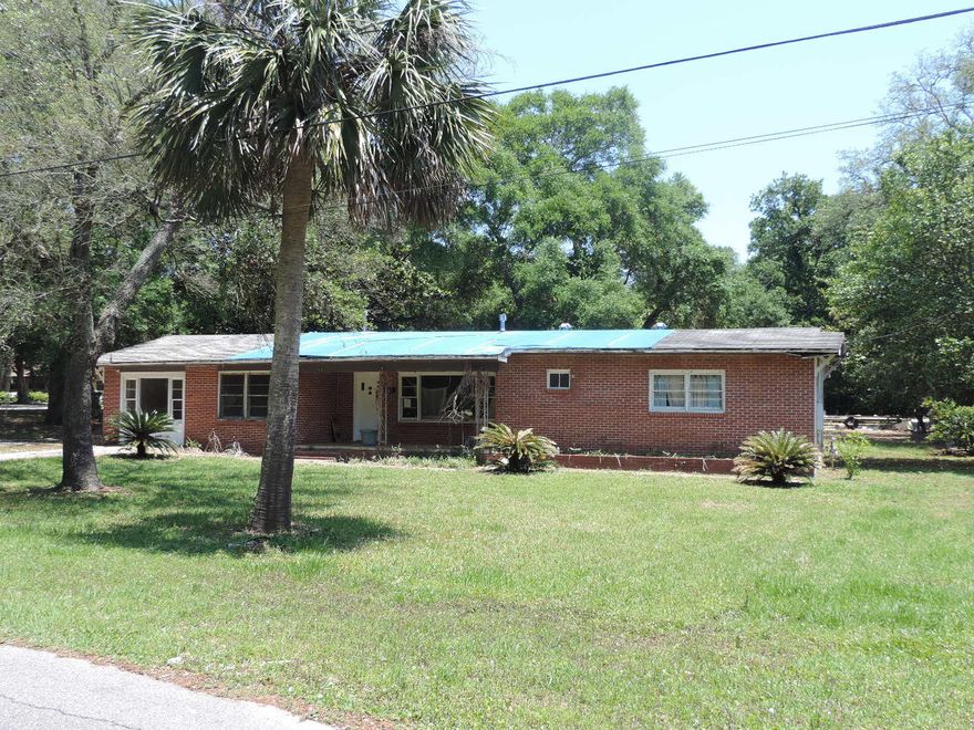 With some love, this 4 bedroom, 2 bath home on a huge lot could be a great year round residence or investment property! Large front and back yard with lots of room to grow! Convenient location to Military Bases, shopping, schools and employment opportunities. Property being sold ''AS IS'' with right to inspect.