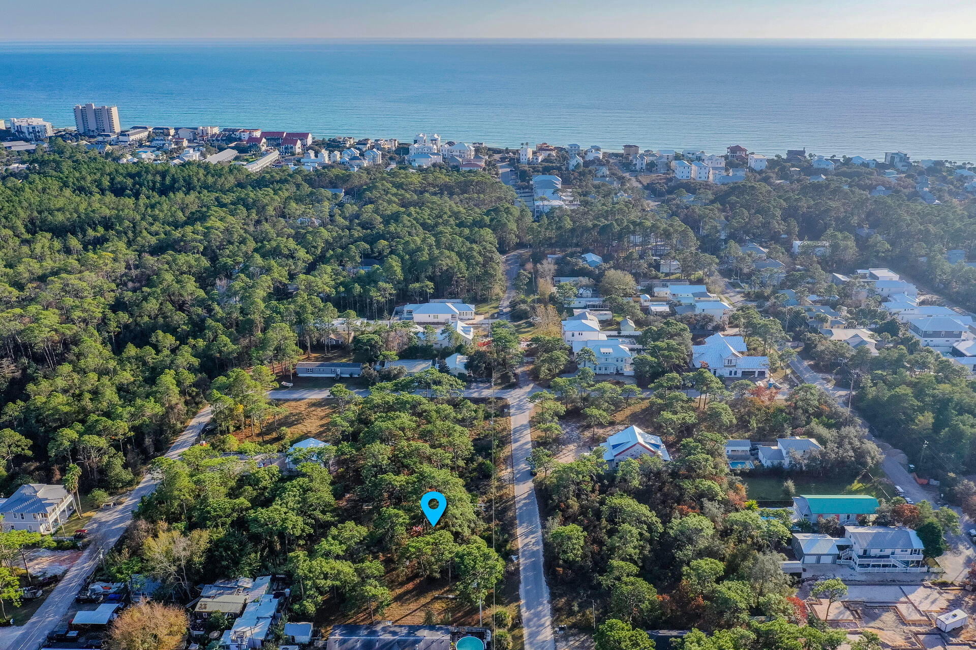 New high and dry lot in the heart of Seagrove Beach! This buildable property is ENTIRELY located in Flood zone X and ready for your beautiful beach home! Just 1\2 mile to THREE beach access points, one w/ bathrooms, showers, lifeguards & parking! Bike, stroll or golf cart to Seaside & Watercolor to the west or Alys & Rosemary Beach to the east. This area is getting bought and built, new construction all around! No manditory HOA or build out times! Come grab some of the last bit of Seagrove! Call a local today!