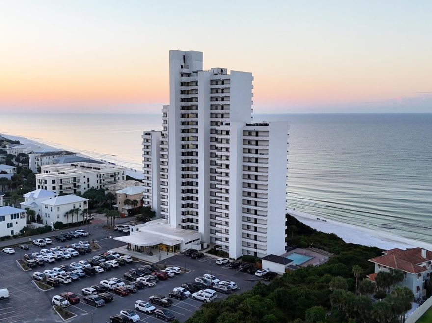 Welcome to Paradise! Located on the 12th floor overlooking the beautiful sugar white sand and turquoise water in Seagrove Beach. Watch the dolphins play while drinking your morning coffee and unwind in the evenings watching the sunset from your extra large balcony. Unit 1205 is one of only a handful of units with a bonus porch adding extra seating! Step inside and enjoy the view from the living room through a large 3 panel sliding floor to ceiling glass door as well as from the master bedroom. With two bedrooms and two full bathrooms, six guests can stay comfortably when using the pull out sofa. The guest bedroom also has additional built in storage space, room for everything you need to enjoy your stay at the beach. One Seagrove Place has been a popular location for families and vacationers for many years. Located just 2 miles east of Seaside, there is plenty to see and do all within a short walk or bike ride along Scenic 30A. Make this unit your great escape and start making memories today! Buyer to verify room dimensions and square footage.