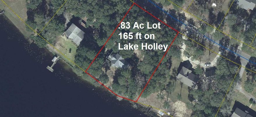 1700 SF, 2 bedroom, 2 bath home on apx. .85 acre with 165 ft on Lake Holley (apx. 200+ ac lake)! Lake Holley Estates is one of the most desirable lakefront communities in Defuniak Springs. with no mobile/manufactured homes allowed & no HOA fees! Front entrance brings you into the main/upper level of home, where you'll find the great room, kitchen & dining, as well as guest bedroom & bath. The lower level consists of the master suite with walk-in closet and sitting area. Master bath has jacuzzi tub and large walk-in shower. This home is in need of some TLC but wouldn't take much to bring it back to it's former glory!