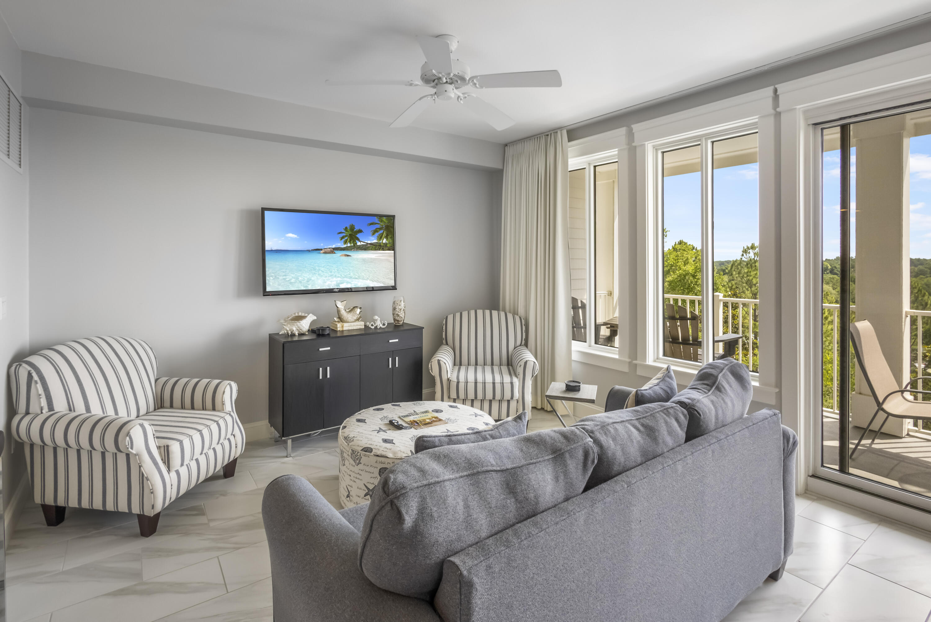 Welcome to your oasis at The Grand Sandestin in this 2022 renovated gem. Every detail has been thoughtfully curated to elevate your resort experience. As you enter, you're greeted by sleek new tile floors that lead you through the open-concept living space, adorned with tasteful furnishings and accents. The living room boasts a newly hung TV, cleverly concealing cords for a seamless entertainment experience. Indulge your senses in the well-equipped kitchen featuring granite countertops, mosaic tiled backsplash, stainless steel appliances and white cabinetry. Both full bathrooms have been fully renovated with subway tiled showers, flooring and vanities that offer a spa-like retreat. Facing northeast, the spacious balcony offers front row seats to the tranquil beauty of the resort grounds. Whether you're seeking a romantic getaway, a family retreat, or an investment opportunity, this property ticks all the boxes. Experience the epitome of resort living, where luxury, comfort, and natural beauty converge in perfect harmony.
The Grand Sandestin welcomes you with gracious architecture and luxurious amenities including a fitness center, Ballyhoo bar, zero entry swimming pool, on-site check-in, and seasonal concierge services. Enjoy the location adjacent to the Village of Baytowne Wharf, a pedestrian market place that hosts a variety of dining and shopping venues as well as day & night activities for all ages.
As an introduction to the Sandestin lifestyle, we invite our new owners to explore amenities that make Sandestin special. The listing brokerage and seller(s) are presenting the buyer(s) of this property with (2) 90-minute rounds of Tennis court time, a golf foursome at one of our three championship courses, and a round of golf for up to four (4) players at the unrivaled Burnt Pine Golf Club.
Sandestin Golf and Beach Resort features more than seven miles of beaches and pristine bay front, four championship golf courses, 15 world-class tennis courts, a 226-slip marina, a fitness center, spa and celebrity chef dining. Shop, dine and play at the charming pedestrian village, The Village of Baytowne Wharf and more. Inside the gates of the resort, residents enjoy a balanced lifestyle of high-class living, spanning the 2,400 acres from the beach to the bay. Everything within the gates of the resort is accessible by golf cart or bicycle. The entire resort is interconnected by miles of pedestrian, bike and golf cart paths that weave through groves of live oaks, meandering past natural lagoons, fountains, man-made lakes, and meticulously landscaped fairways.