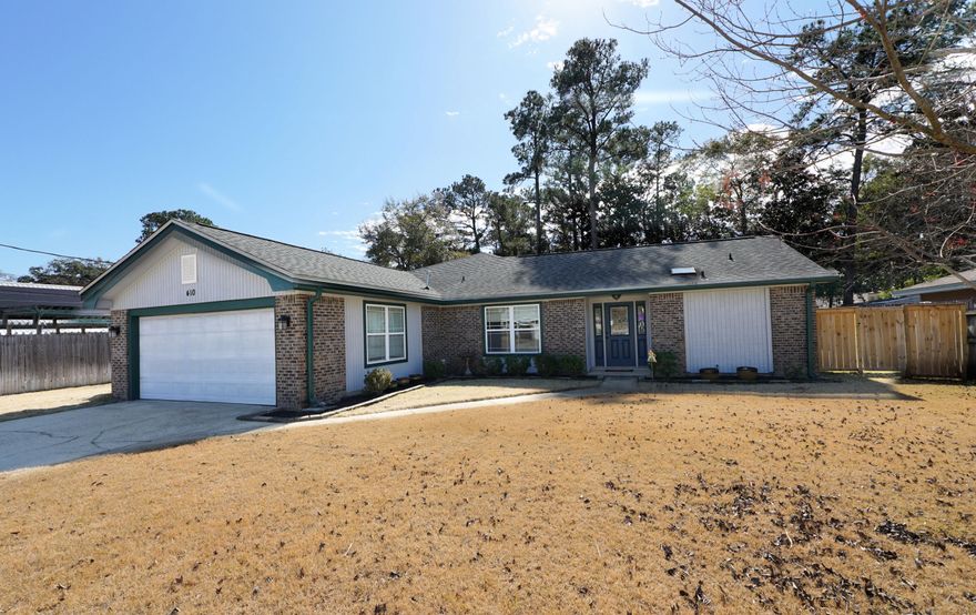 Your Fresh Start Near the Bay. Step into a bright, newly painted interior, including new trim, closet doors and carpet in Bedrooms at 410 Green Oak Ln.  This 1,887-sq-ft residence offers a split-floor plan, ensuring privacy across its three bedrooms and two baths. Home has two living areas with an all season Screened Porch. Outside, the property features a freshly updated exterior and a fully fenced backyard--an ideal canvas for your next summer BBQ or garden project. Situated on a peaceful loop just moments from Bayshore, you're perfectly positioned near Turkey Creek's scenic boardwalks and the Lions Park boat ramp. With top-tier Niceville schools nearby and a seamless commute to Eglin AFB.