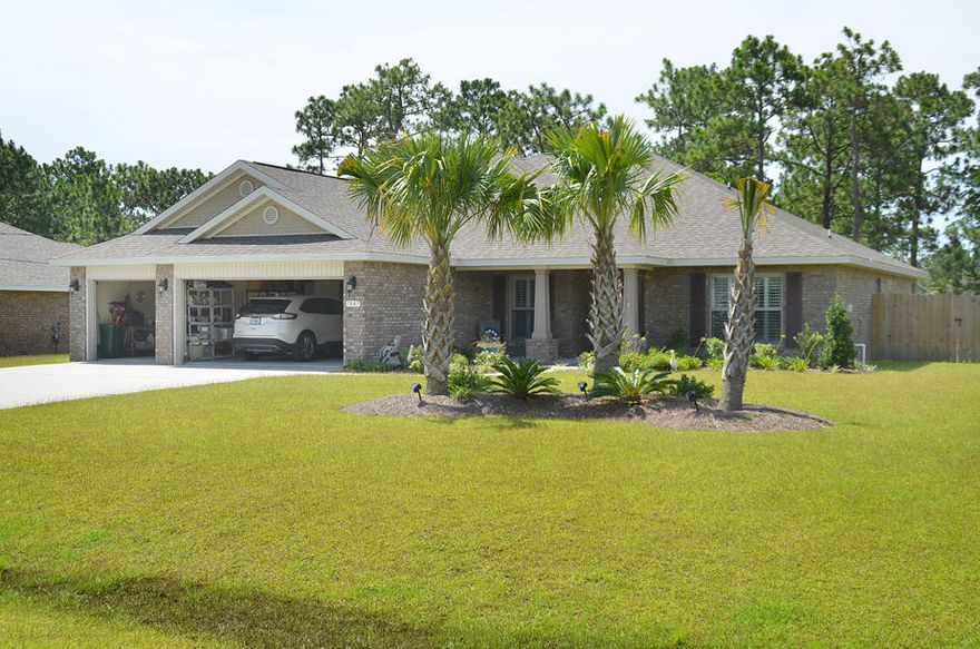 Custom-built home on 1/2 acre with public sewer in HBTS. Mystic Bay III offers a mix of contemporary and traditional design with the formal dining area blended with the family room. The spacious kitchen, with granite counter tops, roll out drawers, tile floors, kitchen eat-in, has a pass thru bar top between the kitchen and family room, perfect for entertaining or gatherings. The master suite is on the opposite side from the 3 other bedrooms. It has a private entry to the rear covered lanai for relaxing with a cup of coffee or just enjoying a view of the yard. The private master bath suite has a beautifully tiled walk-in shower with dual heads and controls. 2 large walk-in closets. Bath #3 is good-sized and has entry to the lanai(more)as well, ceiling fans, tile, boxed ceiling.