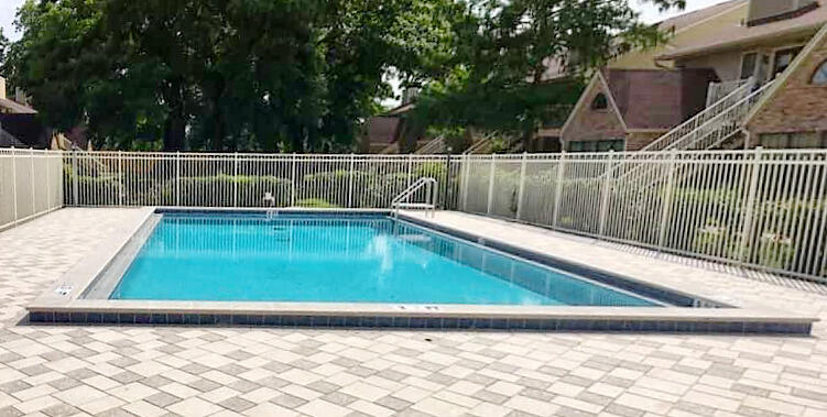 SELLER CALLING FOR HIGHEST AND BEST BY FRIDAY MAY 19th at 8:00PM - This RARE ground floor TWO bedroom unit in Villa's on the Square is NOW AVAILABLE! *Professional Photos Coming Soon!* Currently showing by appointment only, and with a current lease in place thru 6/30/2022, this unit has a rear accessing GARAGE with laundry - which passes through to kitchen, with tile/laminate throughout, a wood burning fireplace, two oversized bedrooms featuring vaulted ceilings and private bathrooms. The welcoming front porch faces the courtyard with double French doors to maximize indoor/outdoor living space! Association dues include high speed internet, pest service and trash service. Call today to schedule your private viewing! *Please access full HOA Docs & Info at www.VillasontheSquare.net*