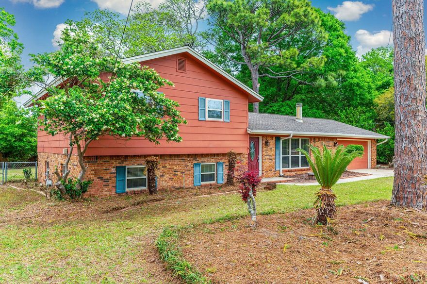 Step into timeless style and comfort with this beautifully maintained mid-century modern home, nestled on a spacious one-third acre lot. Boasting clean architectural lines and abundant natural light, this four-bedroom, two-and-a-half-bath residence offers a perfect blend of classic charm and contemporary upgrades less than half a mile from Poquito Bayou.At the heart of the home, a striking stone fireplace anchors the open-concept living area--ideal for both cozy nights in and stylish entertaining. The sleek, updated kitchen features stainless steel appliances, modern maple cabinetry, and plenty of counter space for everyday living or hosting guests. This lovely home features three upstairs bedrooms and two bathrooms, all with stunning hardwood flooring throughout. The primary bedroom offers two closets and an en-suite bath with a shower/tub combo and a perfectly placed window overlooking the fully fenced backyard.

Downstairs, you'll find an additional spacious living area and a generously sized bedroomideal for a home office, guest suite, or personal gym.

Step outside to enjoy the serene surroundings in the expansive backyard, perfect for relaxing, gardening, or outdoor play.

Don't miss out-call today to schedule your private showing!

