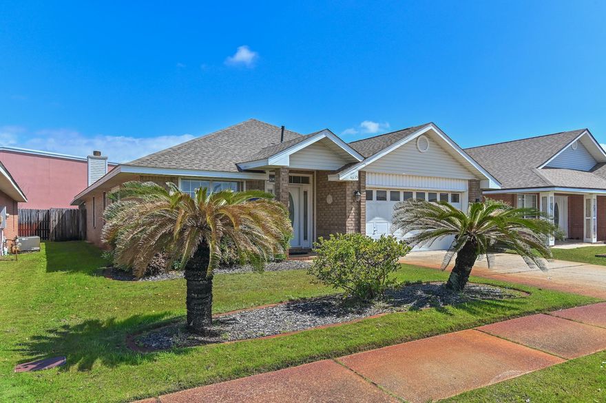 Welcome to the South side of 98 in the short term rental friendly neighborhood of Sunsail! Nestled in a charming, short-term rental friendly community just a stone's throw away from the sun-kissed shores, this inviting one-story brick home with a new roof in 2021 and new fence, offers the perfect blend of comfort and coastal living. Step inside to discover three cozy bedrooms, each adorned with ample natural light and plush carpets, providing serene sanctuaries for rest and relaxation. The heart of the home boasts a warm fireplace, perfect for cozy gatherings on cooler evenings. Transition seamlessly from indoor to outdoor living through to the spacious screened-in porch, where morning coffees and evening sunsets are enjoyed in blissful tranquility. Residents and guests