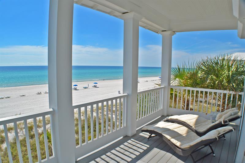 GULF FRONT PARADISE. When opportunity comes knocking it is best to be prepared. This home is designed in response to Florida climate with deep overhang porches facing south. The Living Room and Master Bedroom face south offering splendid views of the Gulf. The Master Bedroom has its own covered porch/balcony allowing for secluded lounging. Open the living room doors and double your living space for entertaining. Gasp visitors with this beautiful central space & view. Floor to ceiling windows are on the main floor and third floor's Master Suite & opens up your view to the gorgeous white sugary sand beach and cool turquoise waters of the famed Emerald Coast. The dazzling experience of owning this spectacular home can be yours. This home has already booked $123,000 in rental income so far.