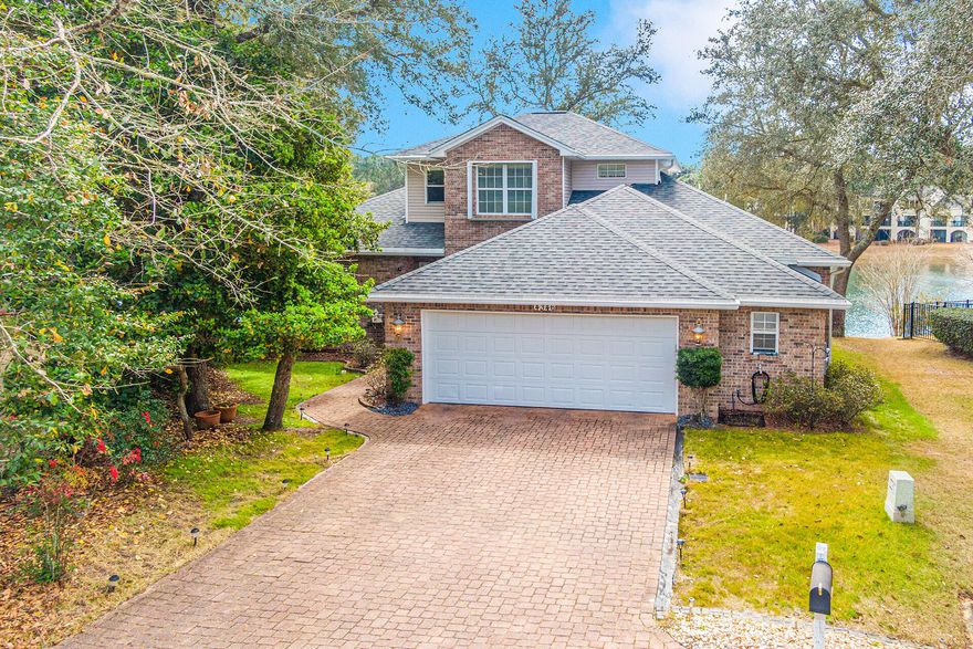 Located in the desirable community of Hidden Lakes in Bluewater Bay. If peace and tranquility is what you're after, look no further than this LAKE FRONT 3 bed, 2.5 bath home located in a cul-de-sac. Open floor plan with an abundance of natural light, and serene water views from every room.The living room offers the perfect gathering space with a cozy gas fireplace, and built-in bookshelves.  The kitchen features white cabinetry, granite countertops, stainless steel appliance package, and a breakfast bar.First floor primary bedroom with gorgeous lake view; en-suite bath with his & hers walk-in closets, double vanity, and walk-in shower. The large deck off the back of the home offers the perfect place to relax and unwind. Upstairs you'll find 2 additional bedrooms and a full bath with