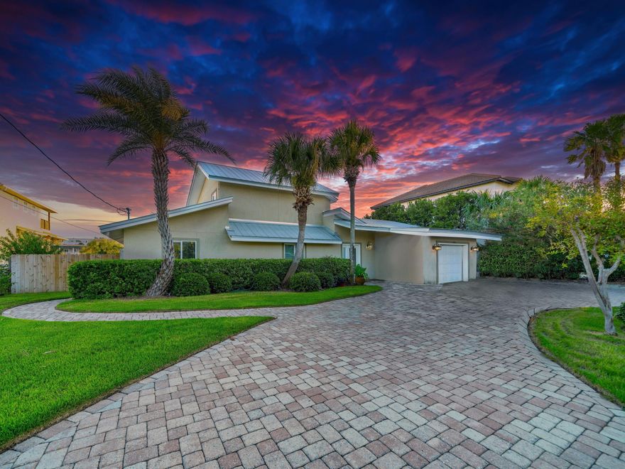 This spacious waterfront home enjoys a stunning location right on a deepwater mooring with two boat lifts and easy access to the harbor and gulf. Even when you're not out on the water, the private pool and hot tub provide canal views while the party-sized observation deck is the ultimate place to view seasonal fireworks and breathtaking sunsets. Inside, the home continues to maximize those waterfront views with an open concept living space and chef's kitchen finished to a high standard of luxury. Gleaming tile floors flow through each beautifully furnished space while the cathedral ceiling provides a sense of airy spaciousness. The corner kitchen is fully equipped for keen chefs with a full range of newer stainless steel appliances. Defined by an angled bar with seating for family and friends, it's a natural gathering place for socializing or enjoying cool drinks and tasty snacks. 

As well as a formal dining area, the great room has a large sitting area for nights in watching TV or socializing with family and friends. With doors opening directly onto the pool terrace, it's the perfect space for parties and entertaining. Four beds provide ample space for extended families with a built-in bunk room that comfortably sleeps six in two twin-over-full beds. The second-floor master bedroom has sweeping views through a wall of windows. It also boasts direct access to the second-floor deck  a great place to wander outside with a cup of coffee before the bustle of the day begins. Two full bathrooms include a master ensuite with a twin vanity and a huge walk-in shower. Protected by a state-of-the-art security system, this beach house retreat is surrounded by a generous landscaped yard with shady palm trees. 

A circular paved driveway offers parking for multiple vehicles while the garage provides additional storage for water toys, kayaks, bicycles and beach chairs. Located on Holiday Isle, this gorgeous home is a short stroll from public access to the beautiful white sand at aptly named Pelican Beach. Big Kahuna's Water Park is a short drive away, along with waterfront dining and shopping at colorful HarborWalk Village. Golf courses, fishing charters and shopping at Destin Commons are all available nearby, making this a highly desirable area for luxury vacation rentals when not in use by the owner. 
