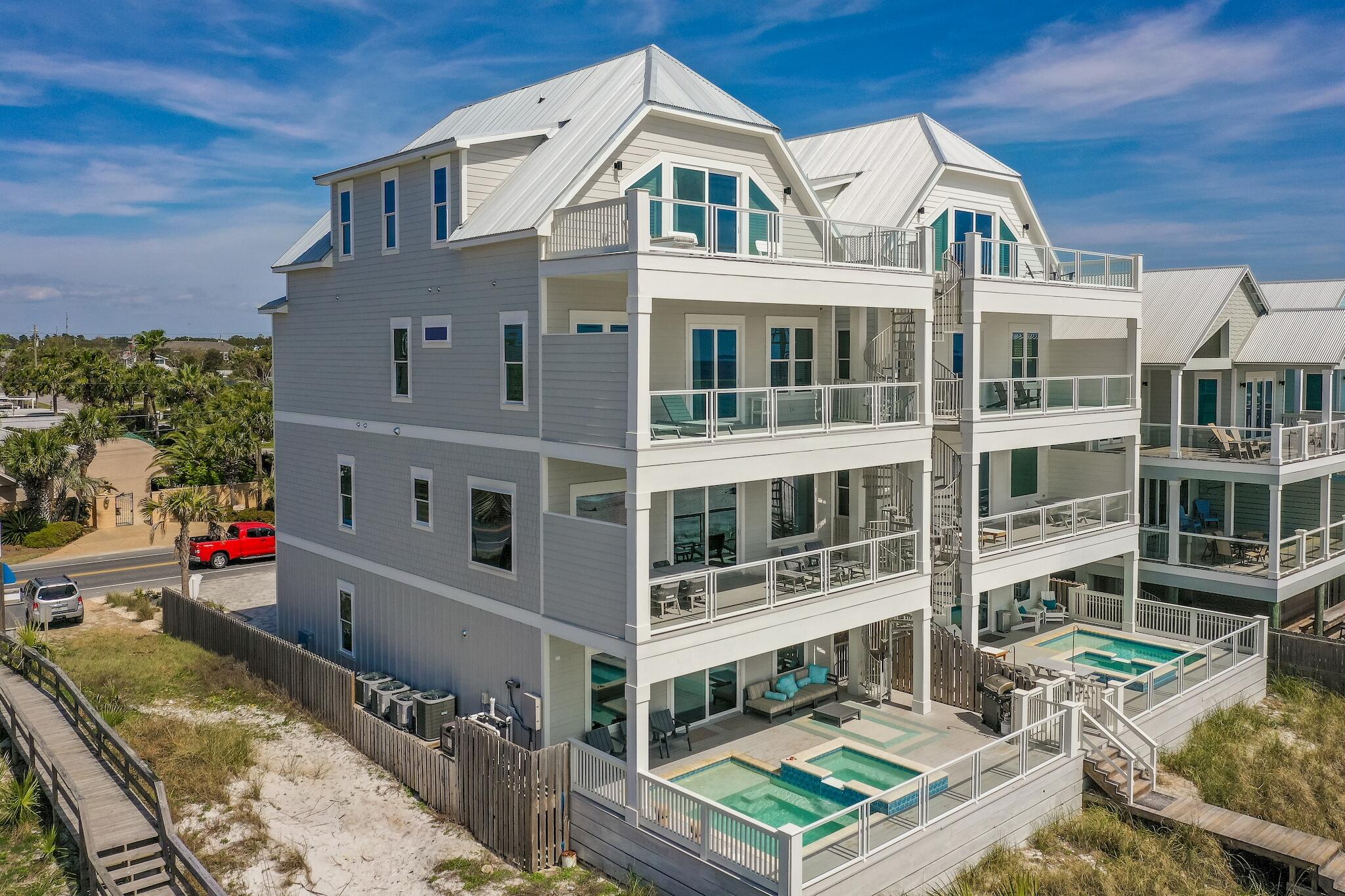 The epitome of class in a beach house! It is beautifully decorated and has enough room for friends and family at the same time.  It has 4 stories, 9 bedrooms and 9.5 bathrooms. Each bedroom has a bathroom and the rooms are spacious and so inviting.  The main kitchen is on the second floor equipped with dining area and balcony for outdoor entertaining. The first floor also has a kitchen and the private pool which overlooks the spectacular Gulf.  Each floor has a balcony and a spiral staircase to make moving from the each balcony easy. This home is one to see to get the full effect of how truly breathtaking it is! Call to make arrangements for your private showing.