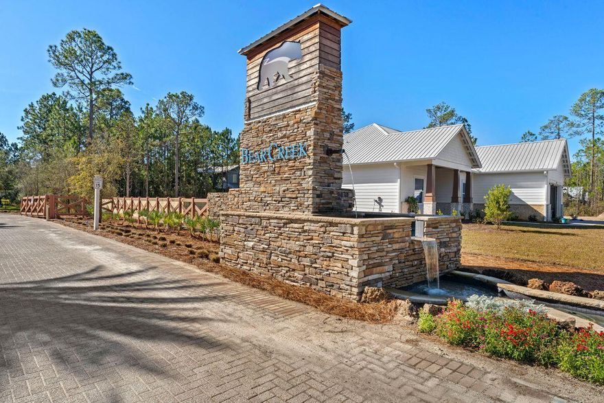 Spectacular lot in the gated Bear Creek subdivision, the perfect place to build your new primary or second home. Ideally located just 15 minutes from the beach, this approximately 68' x 180' lot affords ample room to build a spacious home plus a private pool if desired. Bear Creek features a variety of amenities for owners' of every generation to enjoy including a community pool and playground, as well as tennis, basketball, and pickleball courts and is less than 15 minutes to area golf courses.