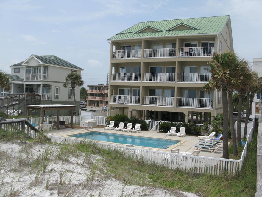 Fabulous gulf and beach views highlight this popular vacation rental property. Perfect beach runaway. Pool and crossover to the beach. End unit so lots of windows. Close to shopping, restaurants and the beach. One bedroom with 2 Hallway bunks. Sleeper sofa so condo sleeps 6 comfortable. Make income on your weekend runaway! Over $36,000 income the past two years. Make the Beach yours!