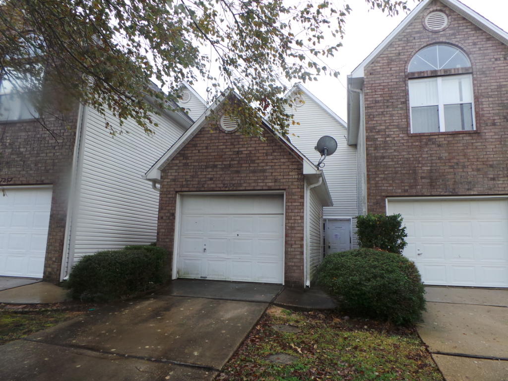 Waterfront Community! This handsome Navarre town home features two bedrooms, two and a half bathrooms and over 1200sqft of floor plan. Downstairs is the family space with living/dining area that is open to the kitchen which boasts a pantry, island and appliances convey and under the stairs is the half bath for conveniency. Upstairs are both bedrooms, spacious, have high ceilings, arched windows and including their own ensuite. Master bedroom offers walk-in closet and jetted garden tub. On those hot summer days, enjoy a dip in the community swimming pool or fish off the community pier. This unit has a one car garage and covered back patio.