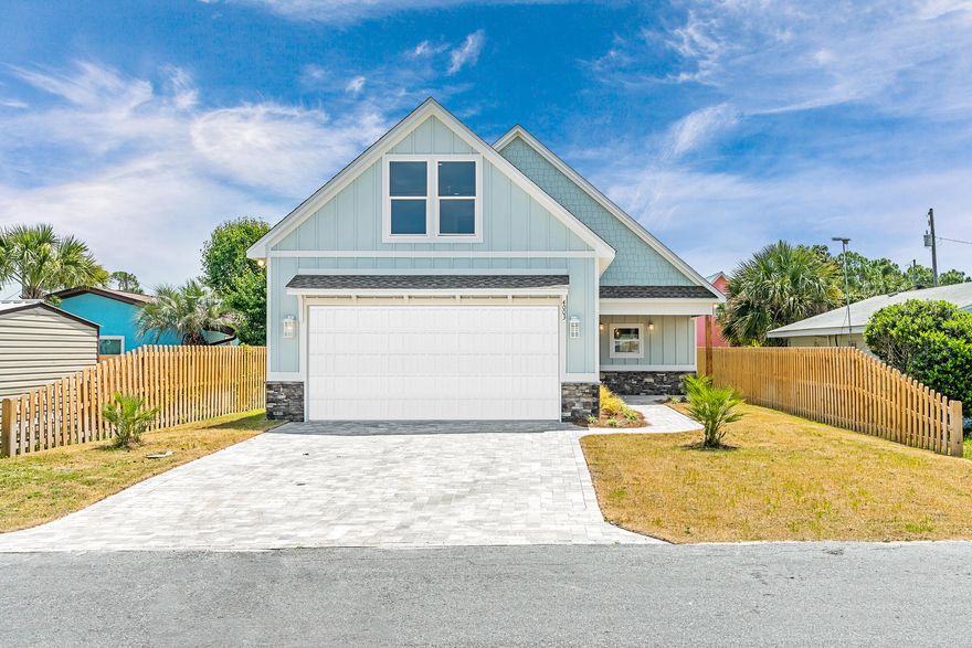 New construction two-story home designed with flexibility and income potential in mind. Located just blocks from multiple public beach accesses, restaurants, shopping, and nightlife, this property offers no HOA and no short-term rental restrictions--an excellent opportunity for investors, second-home buyers, or primary residents seeking strong rental performance.The main level features an open concept kitchen, living, and dining area ideal for entertaining or hosting guests. Kitchen includes custom wood cabinetry, granite countertops, stainless steel appliances (dishwasher & oven), and a vented range hood. Durable LVP flooring extends throughout, complemented by crown molding in the first-floor living spaces and bedrooms. The master suite features a tiled walk-in shower with rainmaker shower head, while the guest bathroom offers a tub/shower combo. A convenient half bath and dedicated laundry room add functionality.

Upstairs, a spacious bonus room provides flexible use as a 4th bedroom, media/game room, or additional sleeping space to increase rental capacity.

Exterior highlights include durable fiber cement siding with stone accents, a shingle roof, and a two-car garage accessed via a brick paver driveway. Outdoor living spaces include a covered front porch, covered back porch with ceiling fan, and a large fully fenced backyard with irrigation system and ample room to add a pool. 

Energy-efficient features include impact-rated windows, spray foam insulation, and a smart thermostat. Conveniently located near parks (Edward F. Hickey Jr Access For All Park 0.2 miles, S. Richard Seltzer Park 0.9 miles, St. Andrews State Park 3.3 miles) and boat ramps (Dolphin Street 2.3 miles, Quail Street 1.9 miles, Safari Street 1.6 miles).

A rare opportunity to own a brand-new home in Panama City Beach with unlimited short-term rental potential and long-term value.