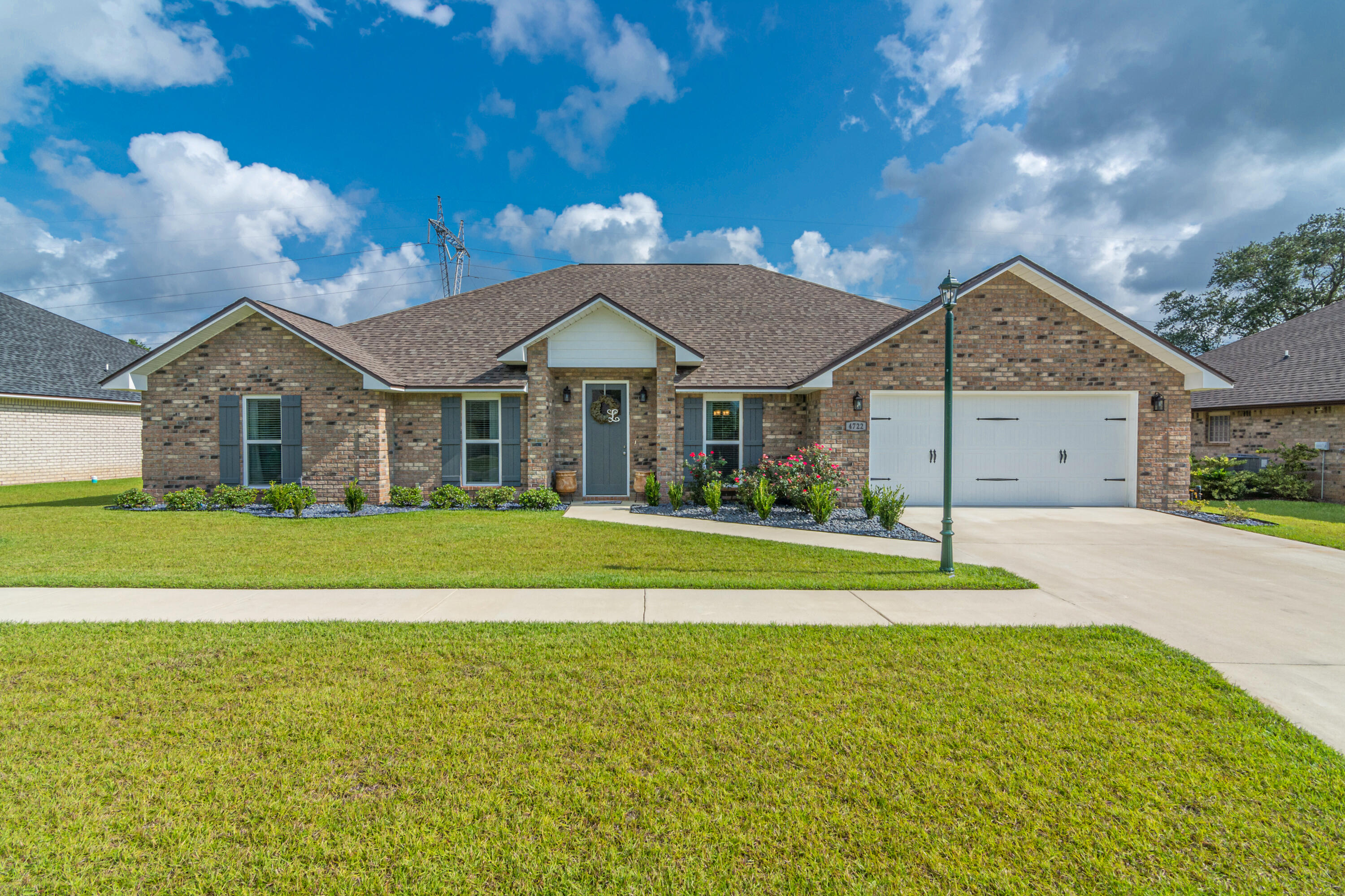 Practically NEW home built in 2020, located south of I-10 in the highly desirable and Gated Community of Chanan Estates with close proximity to 7th Special Forces Group or Eglin AFB. You must see this gorgeous all brick 5-bedroom, 3-bath home with formal dinning area and breakfast nook. There is beautiful tile throughout the kitchen and spacious living room. The large kitchen offers stainless smooth-top range, dishwasher & OTR microwave. The large master suite includes double vanity, private water closet, large soaking tub, & shower. Come see this LIKE NEW home, it won't last long!!