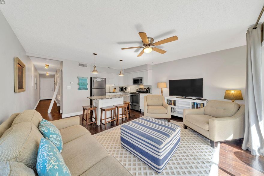 Price Improvement for this enchanting one-bed condo at Beachside captures the magic of the Emerald Coast beaches. The building is a short walk from morning strolls on the white sandy beach, enjoying the gently breaking waves of the Gulf of Mexico. Conveyed fully furnished, this home has rich hardwood flooring and tasteful decor echoing a beach vibe. Granite countertops and stainless steel appliances add an upscale tone to the generously sized open plan kitchen which includes an island breakfast bar for sharing drinks and snacks. The liveable floor plan effortlessly maximizes every space with a built-in bunk space in the hallway, sleeper sofa in the living room and mirrored storage in the master bedroom.