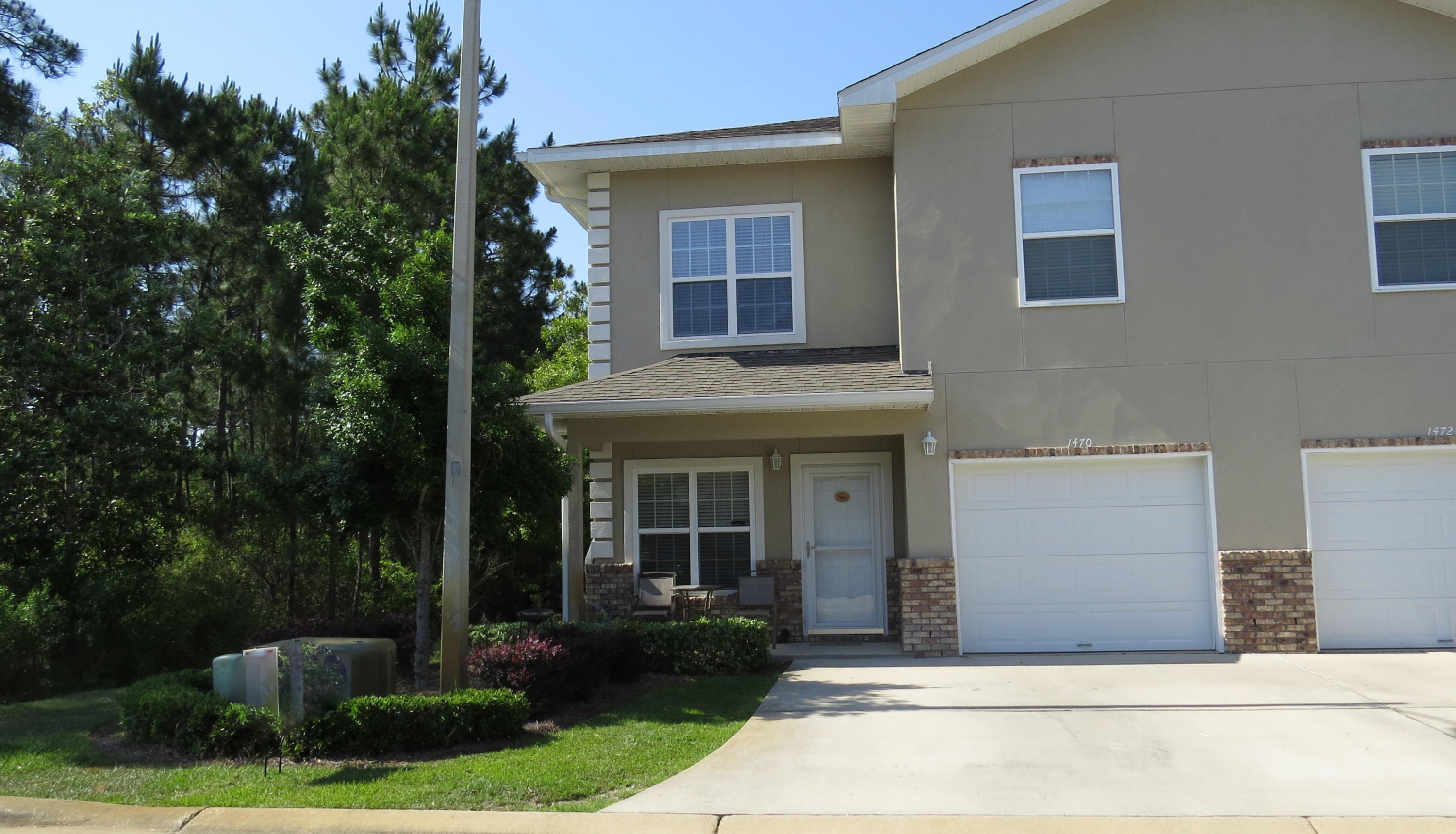 Welcome to Meridian square an executive-style town home development less than a mile from the Hurlburt Field east gate and minutes from Eglin Air Force Base. This floor plan is the largest in the complex, and this home is also end unit, offering a larger yard. As you enter the front door you are greeted by a huge living area with beautiful wood laminate flooring, half bath with granite counters and a very spacious laundry room. Crown molding can be seen through-out the down stairs space and continues into the gorgeous kitchen and dining area. The kitchen boasts granite counters, an island and stainless steel appliances. Upstairs you will find all three bedrooms and a full bath. The master suite has a large walk-in closet and a bath with double vanities and granite countertops. This