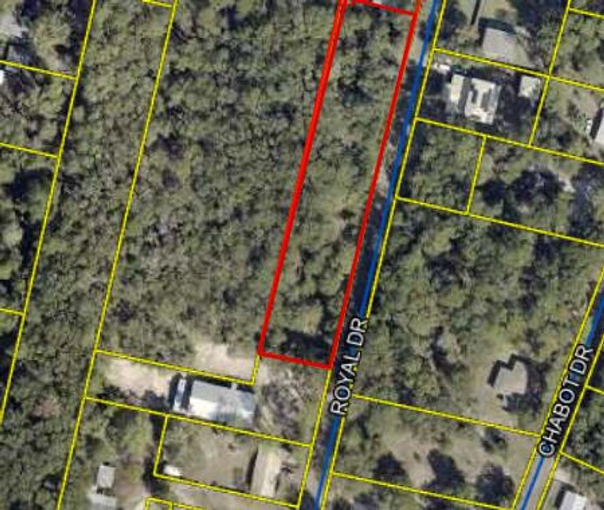 This stunning, high and dry 1-acre lot is located within the city limits of DeFuniak Springs, just a half mile from Lake Stanley. The property is fully enclosed with a chain link fence, providing added privacy and security. With its prime location, the lot offers an incredible opportunity to build your dream home or a peaceful getaway in a quiet, welcoming community. The property is level, well-drained, and surrounded by nature, offering a serene and private setting while still being close to all the conveniences of city living. Whether you're looking to enjoy the outdoors, settle down, or invest in land, this beautiful lot is a rare find and won't last long. Contact me today for more details!