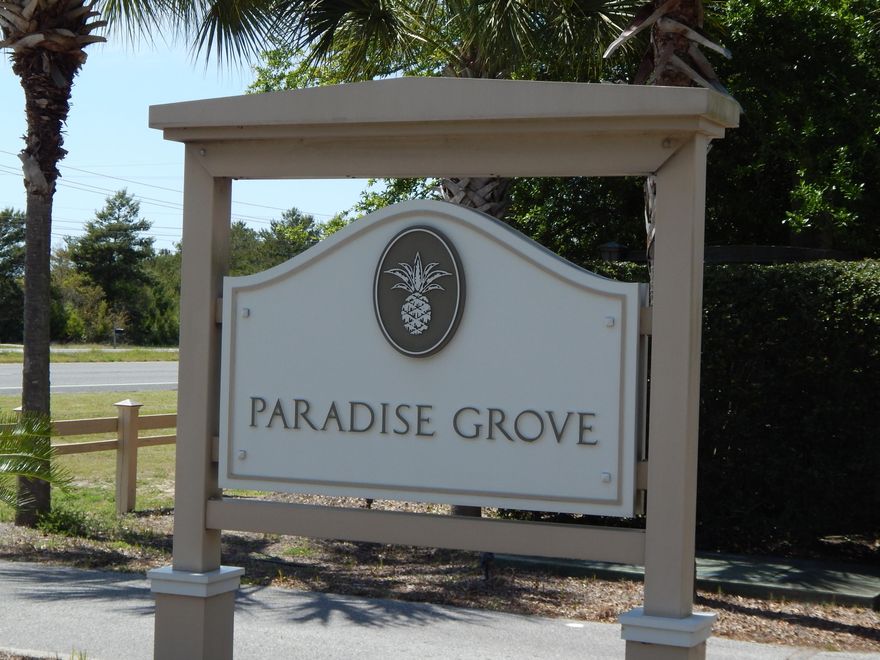 Paradise Grove is a gated community and close to the beach. Neighborhood pool with pool house and bathrooms. High and dry Lot and ready to build.