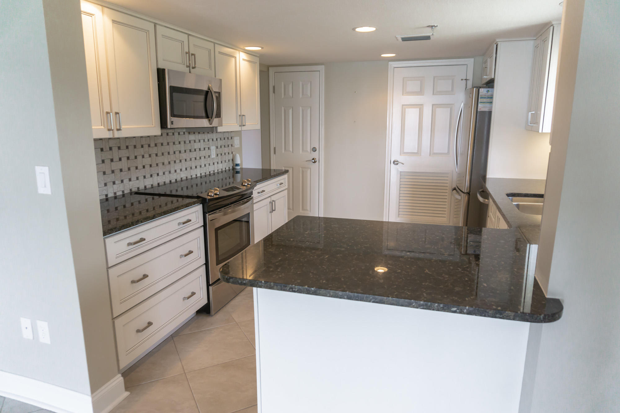 BREAKERS EAST CONDO - Residential