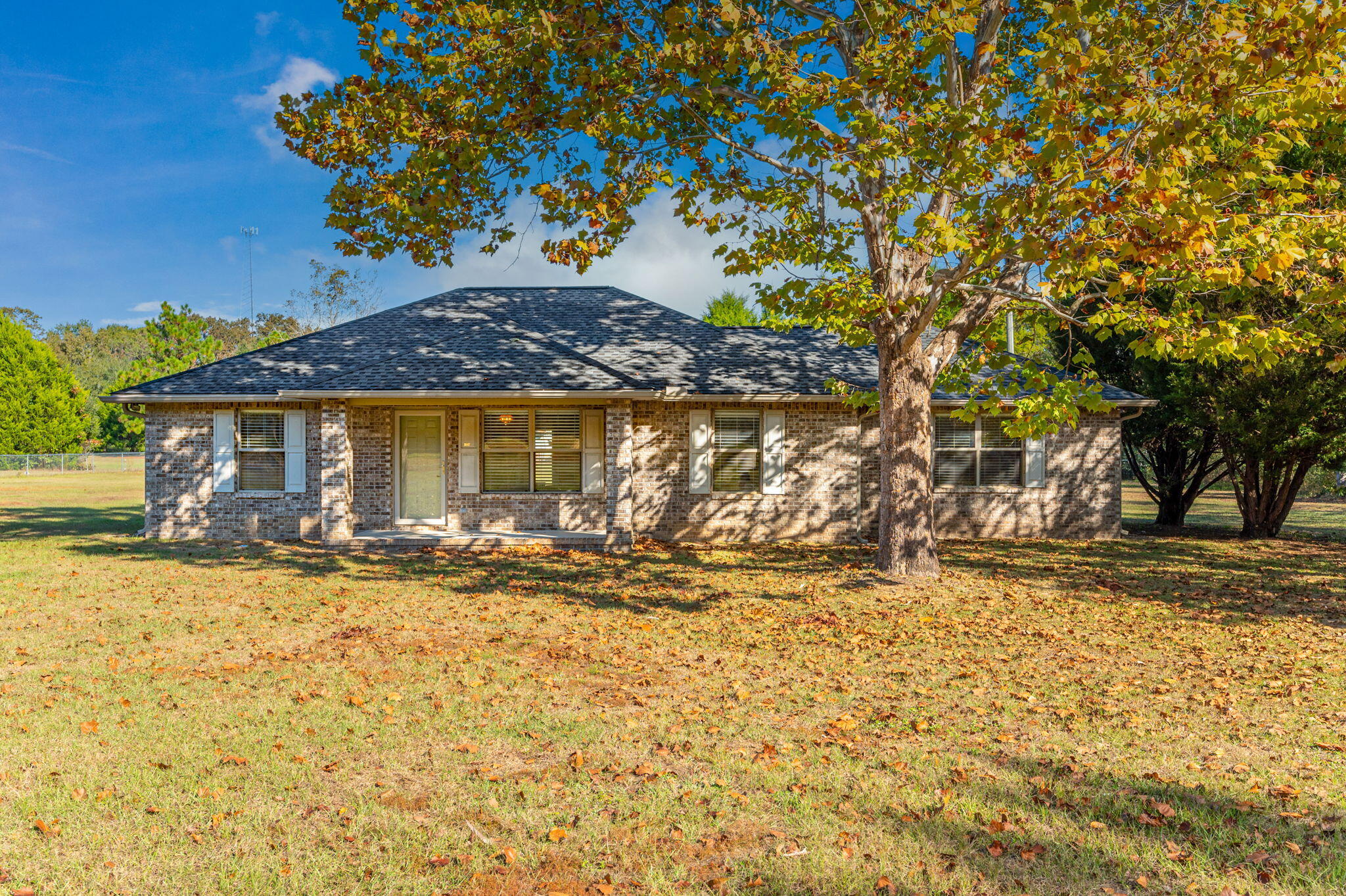 Welcome to this 4-bedroom 2 bath well maintained all brick home located in a quiet area not far from bases, schools, and shopping. Enter the front door and see the vaulted ceiling with large living space. Located on a 1.75 FLAT acre lot, don't miss this one! Beautiful galaxy granite counter tops with ample cabinet space in the kitchen. Vinyl flooring in common areas throughout this home and newer carpet in the bedrooms. This is a split floor plan with an additional room that can be used as a bedroom or anything you desire. Roof, carpet, paint, stove, dishwasher, and microwave were all newly added in 2016. Kitchen granite was added along with a 12X32 storage shed, exterior doors, and gutters were added in 2017.