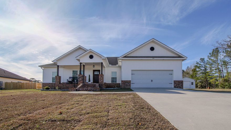 Welcome to this beautifully upgraded home where exceptional craftsmanship meets everyday comfort. The stunning wooded vaulted ceilings and rich wood trim throughout captivate from the moment you enter, showcasing remarkable attention to detail that sets this property apart.The kitchen is a culinary paradise with generous counter space that will inspire your inner chef. The thoughtful layout is designed for both function and flair. Situated on two spacious lots, this property offers incredible outdoor potential with room to garden or simply enjoy peaceful afternoons. A substantial workshop on a concrete slab with electrical in place offers versatile possibilities. Three bedrooms, two bathrooms, attached garage storage, and a quiet neighborhood complete this gem. Schedule your showing today