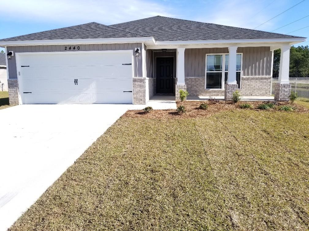 Home under construction. COLORS AND FEATURES MAY VARY FROM PHOTOS. Contact agent. Heather's Place features fully sodded yards, sidewalks, underground utilities, public water and sewer, convenient access to shopping and schools and only 8.5 miles to Navarre beach! Every home comes included with GRANITE COUNTER TOPS tops in the kitchen and bathrooms with under mount sinks, STAINLESS STEEL APPLIANCES in the kitchen, UPGRADED FLOORING in the common and wet areas and carpet in the bedrooms. Separate TILE SHOWER in the master bathroom (in most plans), covered back porches and much more. These homes are extremely energy efficient and all come included with our 1-year builder warranty. Take advantage of our $500 move in special with use of one of our preferred lenders!