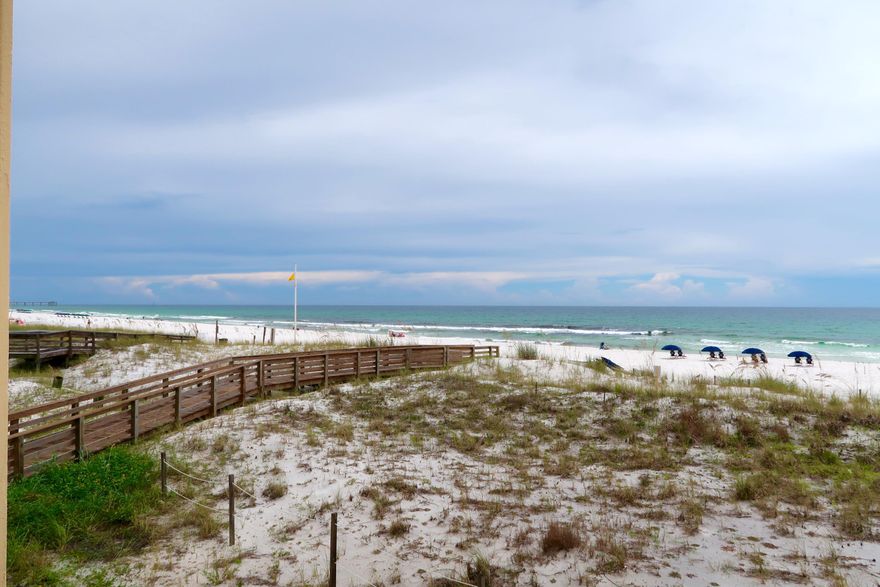 Wrapped in Views... This 3 Bd / 3 Ba Surf Dweller corner unit offers amazing views of the gulf. The interior of the unit has been upgraded with 16'' tile through out including the bedrooms. The floor plan is open which offer views from everywhere. The kitchen has been updated with granite counter tops & also offers a spectacular view. The large breakfast bar is perfect for extra seating for guests. The oversize master bath has large double vanity, separate shower & tub. Step outside to your spacious balcony to enjoy the ocean breezes. You are conveniently located on the 2nd floor to enjoy easy access to the beach, pool & tennis. Don't miss out on this awesome unit.