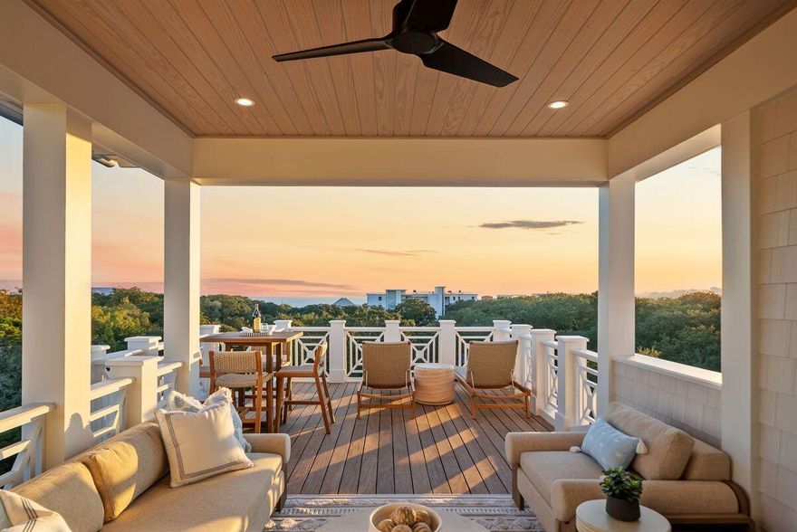 Where Coastal Luxury Meets Elevated Design:This exceptional retreat in Old Seagrove seamlessly blends architectural sophistication with timeless coastal style. The 5,283 sq. ft. residence is offered fully furnished and showcases five bedrooms, including three primary suites, two guest suites, a bunk room, media room, and 6.5 baths.Step through the grand entryway into a light-filled foyer with soaring 12-foot ceilings, setting the tone for the remarkable design within. The gourmet kitchen impresses with Wolf and Sub-Zero appliances, a stone slab backsplash carried all the way to the ceiling, and a generous island perfect for entertaining. The kitchen flows seamlessly to a sitting area and open living room, continuing into a grand dining space just steps from your private wine room. Completing the first floor is one of two primary suites, adorned with custom cypress ceilings and a spa-like bath.
The second floor welcomes you with a spacious landing that leads to a second primary suite with tranquil, spa-inspired finishes and separate soaking tub, an additional guest suite, a media room, bunk room, and an oversized screened porch tucked beneath the oaks  the perfect retreat for coastal evenings.
On the third floor, a secondary living space awaits  complete with a built-in beverage center for effortless entertaining  connecting to a third primary suite option, an additional bedroom, and an expansive outdoor terrace. As you ascend to the fourth floor, you're greeted by an abundance of natural light and a dramatic chandelier, leading to the rooftop deck  a show-stopping perch above the treetops, offering panoramic Gulf views and sweeping coastal vistas.
Designed for indoor-outdoor living, the home features over 1,000 sq. ft. of porches, a private pool and spa, elevator, and wide-plank oak flooring throughout. Every finish and fixture reflects a commitment to quality and sophistication.
Perched on one of Old Seagrove's highest natural elevations  rising 40 feet above sea level  the property offers a rare vantage point with Gulf breezes, serene views, and convenient access to Seagrove's sugar-white sands. Residents enjoy plenty of room to unwind and take in the emerald waters of the Gulf.
In collaboration with NOLA 30A, Fox Construction, Stackable + Mracek, and Design and Dwell, this home represents a masterclass in coastal design, crafted for those who appreciate artistry, architecture, and effortless living.