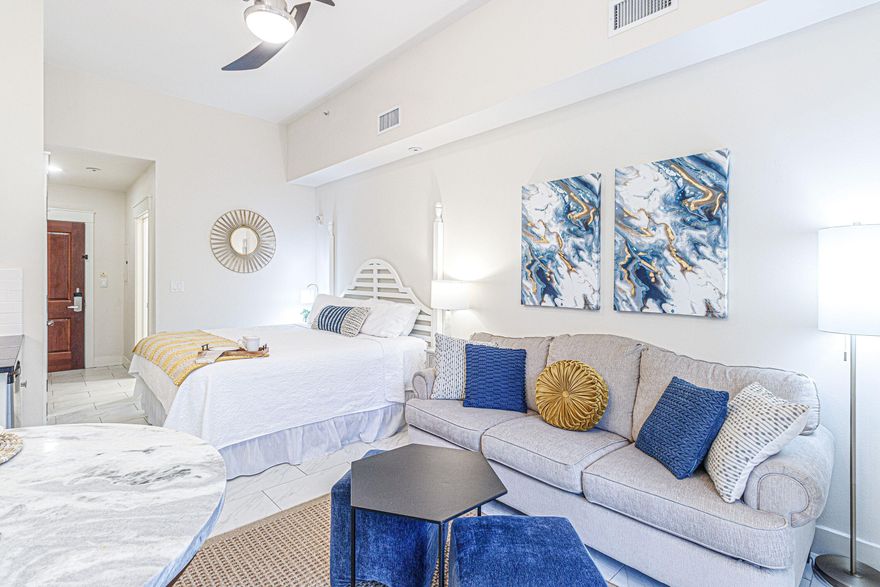 HIGHLY SOUGHT AFTER FRIST FLOOR STUDIO- charming, beautifully updated furnished studio has it all! Ideally situated on the first floor, this light-filled condo is rental-ready with a fresh new look, stylish furnishings, and soaring 10-foot ceilings. Just steps from the heart of Baytowne Wharf, you'll enjoy easy access to dining, shopping, live music, and year-round events. With a king bed and queen sleeper sofa, it comfortably hosts a couple, small family, or group of friends. The tennis center is nearby, and beach access is just a quick ride away via car or Sandestin's shuttle. With a strong rental history and priced to sell, this is a rare opportunity to own a piece of the resort lifestyle. Financing options available with lenders. Air conditioner 2023
New furniture, decor, bed, bedding, mattress 2022, pillows, 
lighting, drapes, microwave, coffee pot, toaster, silverware, plates, glasses, bathroom vanity, bath, shower and sink faucets, refreshed tile. outdoor furniture and refreshed outdoor space. 

Sandestin Golf and Beach Resort features more than seven miles of beaches and pristine bay front, four championship golf courses, 15 world-class tennis courts, a 226-slip marina, a fitness center, spa and celebrity chef dining. Shop, dine and play at the charming pedestrian village, The Village of Baytowne Wharf and more. Inside the gates of the resort, residents enjoy a balanced lifestyle of high-class living, spanning the 2,400 acres from the beach to the bay. Everything within the gates of the resort is accessible by golf cart or bicycle. The entire resort is interconnected by miles of pedestrian, bike and golf cart paths that weave through groves of live oaks, meandering past natural lagoons, fountains, man-made lakes, and meticulously landscaped fairways.
