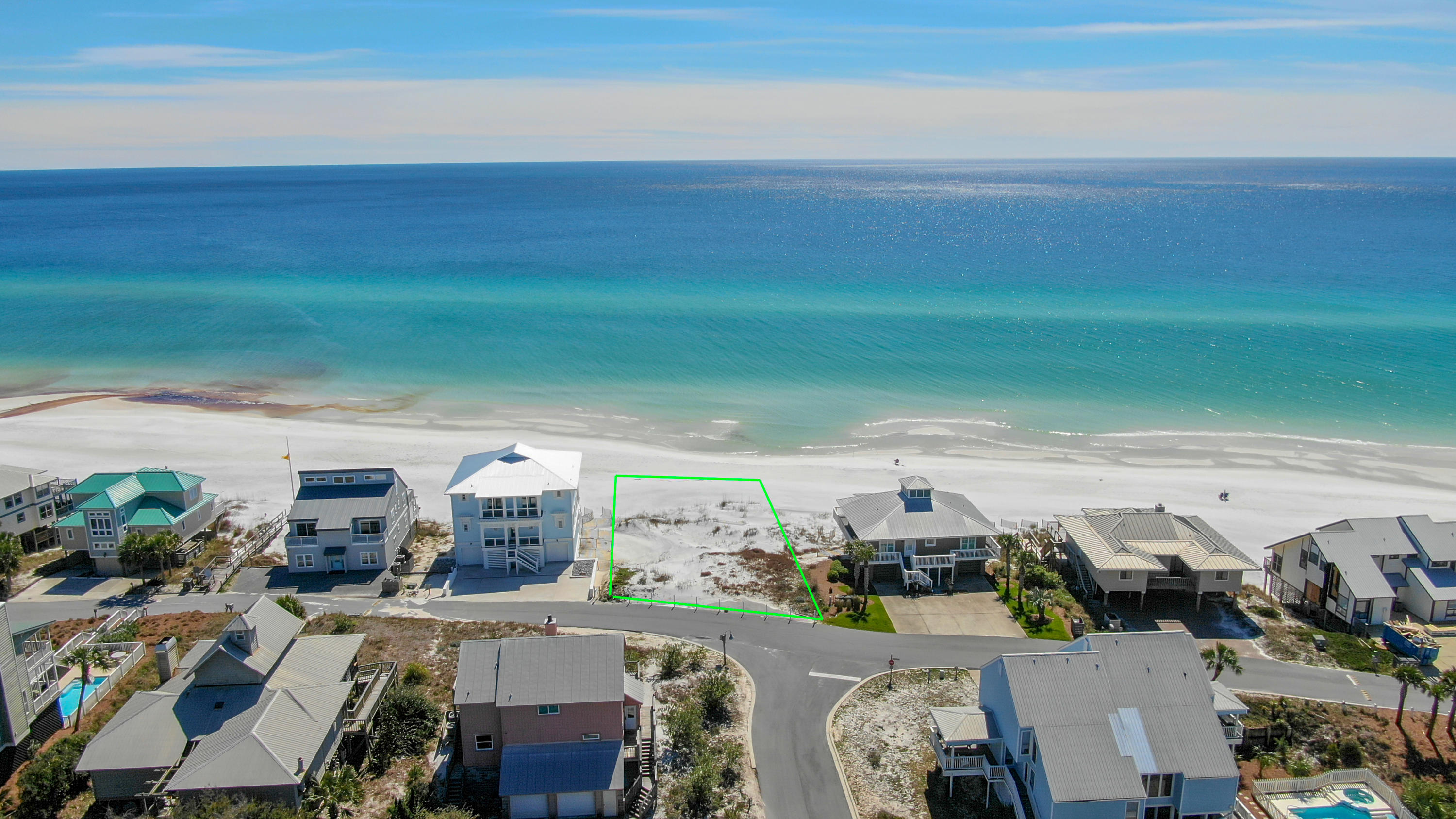 Over 77 feet of water frontage on the Gulf of Mexico make this property a very rare find! Measuring 250 feet deep x 77 feet wide, this parcel offers the opportunity to construct a large beach front home! Permitted plans approved by the county will convey with the sale. Start building immediately! Located in the private neighborhood of Gulf Trace in Grayton Beach, future homeowners will experience a serene lifestyle that cannot be found elsewhere. Breathtaking sunset views over the emerald green waters will characterize this future estate. This future home will make the perfect second home, investment property or permanent residence! Do not miss out on one of the few remaining Gulf front pieces of property on 30A!