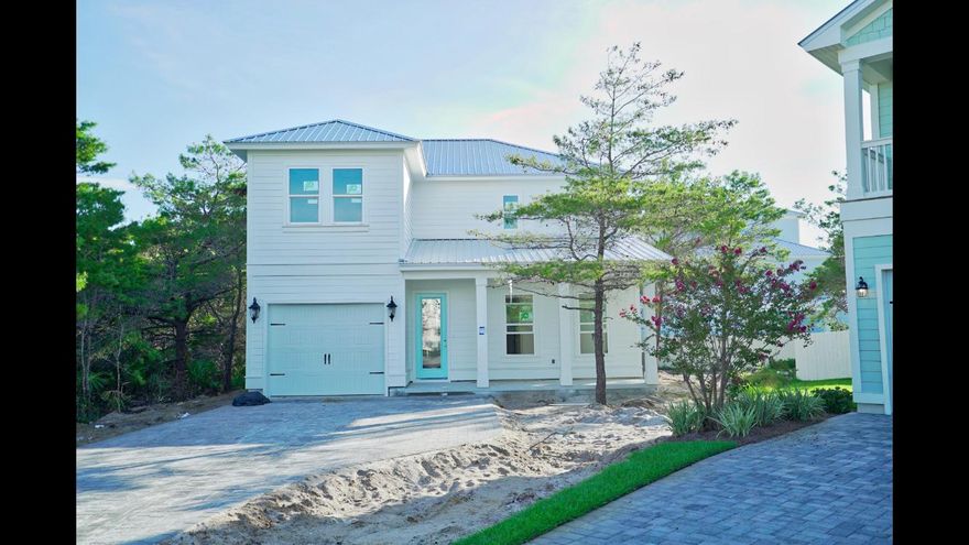 New 4 bedroom home just under 2,600 sq ft. in secure gated subdivision that is walking distance to the gulf. Home is newly completed. The beautiful community pool, clubhouse, and cobblestone roads make this a truly charming neighborhood.