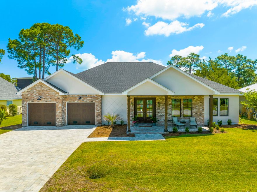 Welcome to your dream home! As you step inside, you're greeted by an elegant office space featuring exquisite antique doors, ample natural light, and a generously sized room perfect for productivity or relaxation. Entertain guests in the spacious living room adorned with 12-foot ceilings, a cozy fireplace, and large sliding glass door inviting in the picturesque views. Featuring a surround sound system that plays throughout the home in the living room, office, master bedroom and bath, kitchen, and the back porch. The gourmet kitchen is a chef's paradise, boasting a 5-pilot stovetop, elegant quartz countertops, an abundance of cabinet and counter space along with a massive pantry for all your culinary needs. The meticulously designed Master Bedroom seamlessly connects to a luxurious master bathroom, offering tranquil features like a steam shower, intricate details, and a premium sound system. This bathroom leads to a spacious master closet, linked to a well-equipped laundry room for added convenience. 

On the opposite side of the house, the two additional bedrooms share a Jack and Jill bathroom with unique touches, including separate sinks and closets, along with a stylish herringbone-tiled tub in a connecting space between them. Unwind in style at the sleek wet bar, featuring a mirrored backsplash, an ice machine, and exquisite glass cabinet detailing. 

The resort-style pool area is a true oasis, featuring a hot tub, fire pit, and a 20x30 heated pool surrounded by elegant pavers. This home does not lack attention to detail, the extended garage was designed to allow for extra room to park a truck or suv inside comfortably. 

The neighborhood boasts convenient bay access, complete with a private bay front park with a new dock and swim platform. As well as a newly resurfaced tennis court & 4 pickleball courts.