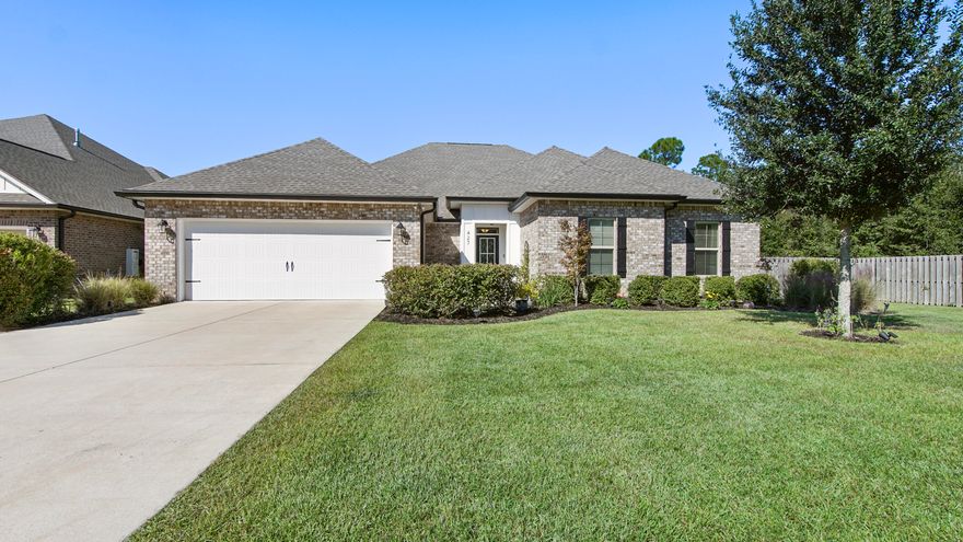 Welcome to 427 Blaze Blvd in The Trails of Hammock Bay, DSLD's sought-after,''Christopher'' w 5 beds, 3 full bath 2-story,  3374 sq' of living- PLENTY of room for everyone!!! Wood-like tile floor throughout main living area and plush upgraded carpet in all bedrooms and Bonus Room. 10' ceilings in Foyer, Kitchen And Dining Room. Open concept Great Room/Kitchen-white shaker style cabinets, Frigidaire appliances (Refrigerator is incl), quartz counters with so much storage and counter space! Black hardware accents. Great Room w BOLD NAVY accent wall and gas fireplace. A GREAT LAYOUT!!!  $30K upgrade in Mud Room and Laundry Room-custom cabinetry (reaches to ceiling for extra storage), custom blk walnut folding counter in laundry and fold out hanging bar. Touch screen ADT security system stays w house. Gorgeous designer wall paper in laundry and mud room which coordinates with custom painted cabinets. Washer/dryer convey!  Ready to do laundry on day one- in a beautiful space!!!  2 car garage w custom ''Slat Wall'' for all the beach chairs, beach/pool gear. First floor master on one side of house w oversized Main Bath- soaker tub, walk-in shower, LARGE closet which connects to the Laundry Room, added BONUS! Double sinks w quartz counters, Black framed mirrors and tiled floor. 3 additional bedrooms on opposite side of house on first floor w additional bathroom. And an extra ''flex/workspace''- great for school work or a work-from-home office.  The 2nd floor has a BONUS/FAMILY ROOM w another bedroom and full bath. Great for MOVIE NIGHTS!!! The LOT-is an oversized end lot w woods on one side, 6' privacy fence surrounds backyard and a 24'x12' brick paver patio to enjoy the beautiful outdoors. INCREDIBLE AMENITIES of Hammock Bay- 3 Pools, Clubhouse, Fitness Ctr, Bball, tennis and pickleball courts, General Store, Props Brewery FUN FOR ALL!!!