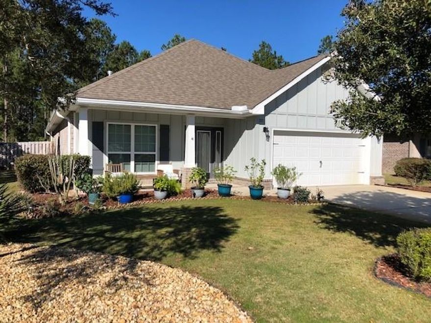 Nicely upgraded, like new home on the preserve in the quaint Passages neighborhood. This one story features 3 bdrs/2 baths/ 2 car garage. A beautiful leaded glass front door opens to the foyer. to the left is the flex/office w/glass french doors. An open concept floor plan - the large kitchen inc an island w/granite countertops, stainless appliances and gas cooktop. A spacious dining area. Living rm w/gas fireplace, tile flooring The liv rm and mbdr has trey ceiling, crown molding. Mbdr has hdwd floors, the mbath features a walk in closet, dbl vanity, separate shower and tub. Additional 2 bdrs have walk in closets and share the hall bath. No carpet! The laundry inc the washer/dryer. Covered screened porch overlooks the privacy fenced in large back yard and nature preserve. Sprinkler w/pump