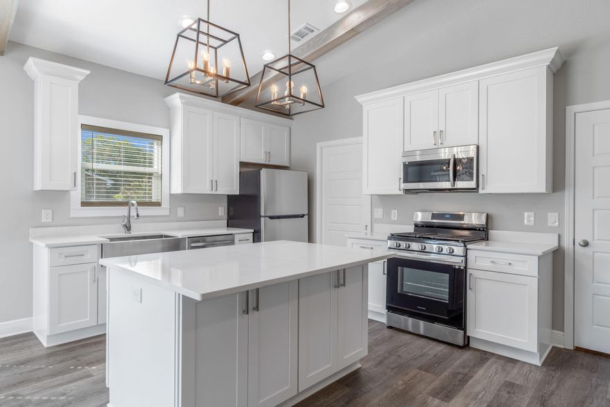 This adorable, semi-custom, Craftsman-inspired new construction home offers comfortable and flexible living with 3 bedrooms and 2 bathrooms, providing endless opportunities to make it truly your own. Thoughtfully designed with both style and comfort in mind, the home features stainless steel appliances, quartz countertops, tall kitchen cabinets with crown molding, 9-foot ceilings throughout, and a family room with high vaulted ceilings, creating a bright, open, and welcoming space perfect for everyday living and entertaining. A freestanding gas range and tankless hot water heater deliver modern efficiency and convenience--no more running out of hot water. The primary suite is a true retreat, showcasing dual vanities, floor to ceiling tiled shower, free standing tub and an oversized walk-in closet. What truly sets this home apart is the opportunity to personalize it to your exact preferences. Buyers may choose from variety of flooring options, select their preferred countertops color, and customize cabinet finishes to match their style. Built with a strong focus on quality craftsmanship and attention to detail, this home offers a personalized building experience designed to exceed expectations. Don't miss this opportunity to own a beautiful, semi-custom home designed with care and flexibility in mind. Estimated completion the end of April, 2026. *Photos are stock images and do not reflect actual lot-specific finishes. Images are of similar homes previously built*