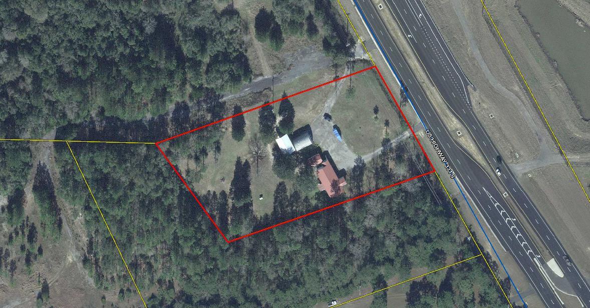 Zoned light industrial, separate building with office space, break room and storage completely updated wiring and plumbing. Deep well and septic system. Additional outside storage building with cement floors, stucco block walls and metal roof. There is a 12' x 12' rear porch with metal roof. Large galvanized aluminum steel building 34' x 25' with high ceiling and 2 rollup doors. Buyer(s) are responsible to personally verify all details for property and dimensions. Any information contained in this listing is believed to be accurate but is not guaranteed. Agents, please call listing broker for access.