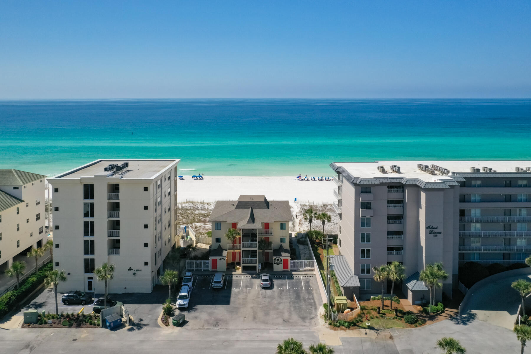 Enjoy beachfront living in this turnkey ready 1-bedroom, 1-bath condo located on the top floor of the desirable Tiki Beach complex on Okaloosa Island. Unit #31 offers direct Gulf views, an open floor plan, and beach access--an excellent opportunity as a full-time residence, vacation home, or investment property.This bright and welcoming unit is filled with natural light and features an open-concept living and dining area that flows seamlessly into a well-equipped kitchen. The spacious bedroom offers generous storage and comfortable furnishings, while the living area includes a pull-out sofa for additional guests. A stackable washer and dryer are included for added convenience.The condo offers a direct Gulf-front location, is sold fully furnished, gated beach access, reserved parking, and additional storage on the 1st floor.
The building is pet-friendly for owners and, per the seller, allows short-term rentals. Buyer to verify all rental and pet restrictions independently. The HOA fee includes internet, cable, water, trash, insurance, reserves, community association management, and part-time building maintenance.
Nearby points of interest include The Gulfarium, Wild Willie's Adventure Zone, and the vibrant Fort Walton Beach area, with dining and entertainment options.