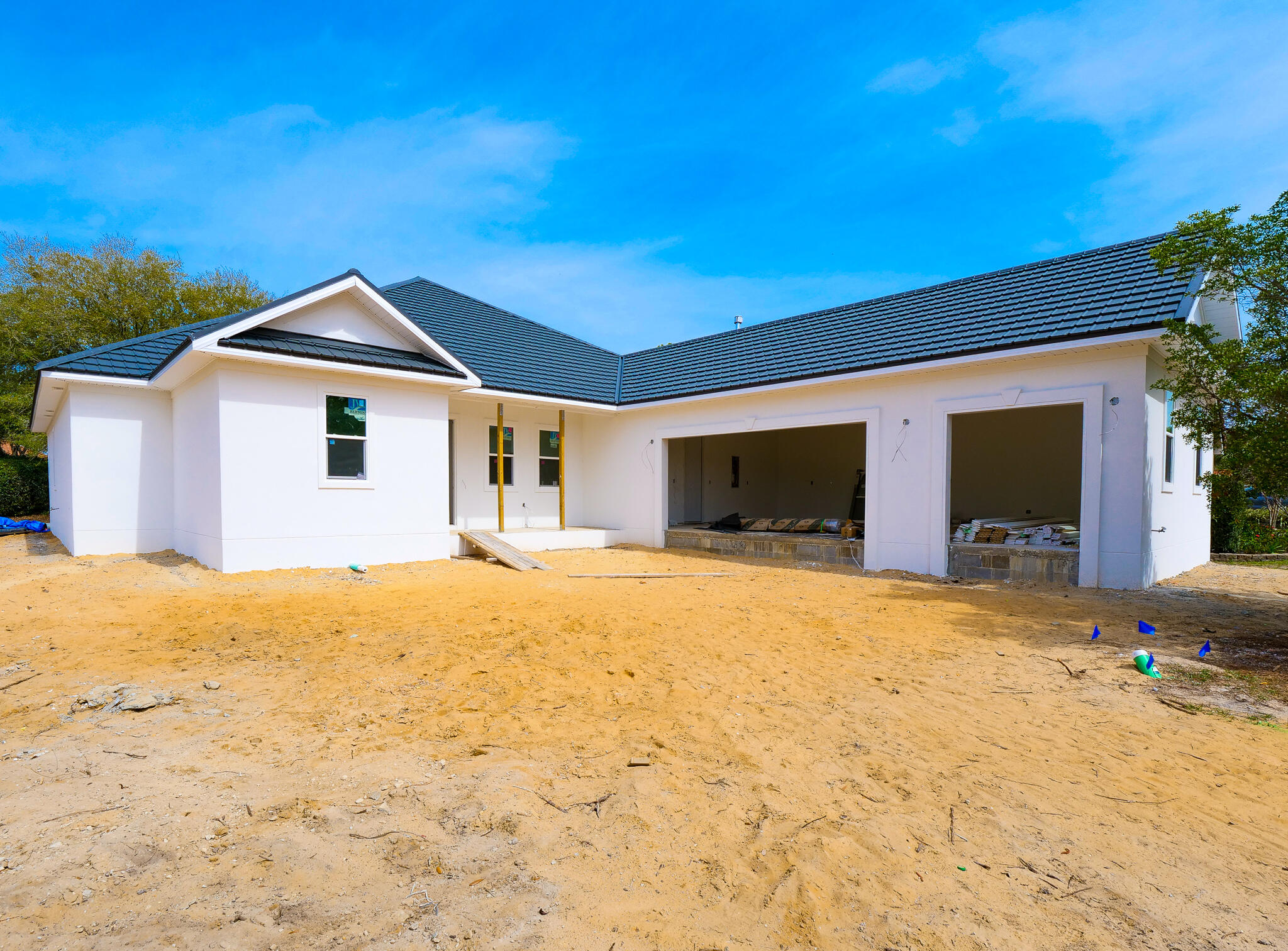 ***Under Construction - MOVE IN BY MEMORIAL DAY WEEKEND!!!*** Take a look at this Beautiful 4 bedroom 3 bath home within a couple of blocks from the Bay in the lovely gated community of Sunset Beach in Bluewater Bay! With a slate-tile roof, this home is  accented with arched walk-throughs, bull-nosed corners, 10' ceilings, gas fireplace, and  upgraded appliances with gas package. Pure white walls adorn this home, Acadia style flooring, and upscale finishes & fixtures throughout. There will be Ice White Quartz counter-tops with a grey dove backsplash in the kitchen, Jarlin White shaker cabinets w/soft close, large walk-in pantry, and a huge central island with a  breakfast bar. You truly don't want to miss out on this one as it will be a Must See, so schedule your appointment today!