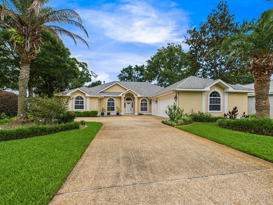 Situated on an oversized lot and a half, this beautifully updated and meticulously maintained 4 bedroom, 2 bathroom home offers a split floor plan, high ceilings, and an abundance of natural light throughout. From the moment you walk in, you'll notice the rich wood-look tile flooring, elegant crown molding, and plantation shutters. The spacious kitchen is a true focal point, featuring granite countertops, solid wood cabinetry, stainless steel appliances, and a breakfast bar that opens into a comfortable dining nook. The kitchen flows seamlessly into the large main living area, where you'll find vaulted ceilings, a gas fireplace, and two sets of quadruple sliding glass doors that open fully to a massive screened-in lanai. The primary suite is generously sized and privately located, complete with a trey ceiling, two walk-in closets, dual vanities, a soaking tub, and a separate shower. All secondary bedrooms are comfortably oversized, offering plenty of space for guests, kids, or a home office. Enjoy a peaceful backyard that backs up to protected green space which means no rear neighbors for added privacy. The oversized 3 car garage offers ample storage, and the extended driveway accommodates extra parking with ease. Additional upgrades include a new roof (2021), new HVAC system (2023), water heater (2021), and updated electrical panel. All the big-ticket items have already been handled for you. Enjoy the Florida lifestyle with access to Bluewater Bay's golf course, tennis center, marina, walking trails, and community pool just minutes away. This home combines quality construction, stylish updates, and a prime location making it a standout opportunity in one of Niceville's most desirable neighborhoods.
