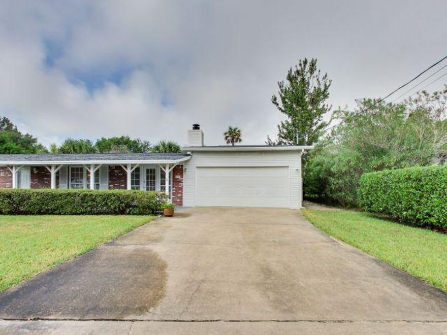 Look No Further! 3 Bedroom 2 bath, one story home, 2 car garage with a pass through garage door into the back yard, located in Destin. This home has been updated with a new roof in 2005, new AC and Heat, and a new hot water heater in 2014. All new copper wiring throughout in 2014. The owner has updated the kitchen with granite countertops, tile flooring, new lighting, and new stainless appliances. The living room is very spacious with a wood burning fireplace. The laundry room is large and it includes a washtub area leading out to the garage. The property has been updated with a long paver driveway, paver patio off the screen porch, and all new landscaping in the front and back yard. There is a work shop-Shed in the back area that is wired with electricity. Plenty of boat parking!