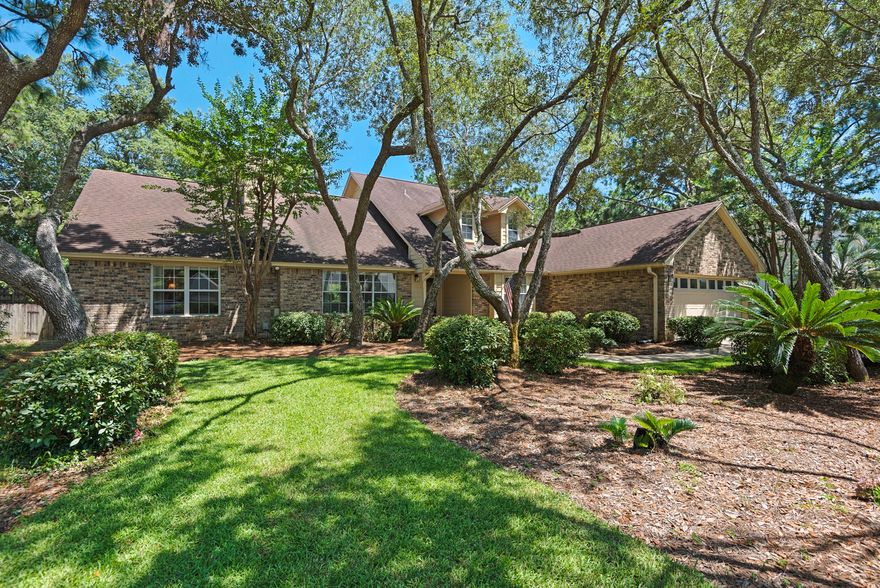 Southern Charm defines this 4 bedroom, 3.5 bath home located in the sought-after gated community of Southwind, in the premier coastal community of Bluewater Bay. Just perfect for entertaining family or just day-to-day living! The front yard welcomes you with the landscaped Oaks, hydrangeas and azaleas. Exceptional quality and careful attention to detail are evident throughout the 3008 sqft. The foyer greets with raised ceilings and hardwood floors that flow throughout the home (3 bedrooms are carpeted, fourth bedroom/mother-in-law suite hardwood flooring). Recently renovated kitchen features granite counter tops and breakfast bar with brand new Stainless Steel appliances (Fridge has water and ice-in-the-door), custom painted cabinets with plenty of room for all your kitchen gadgets and so