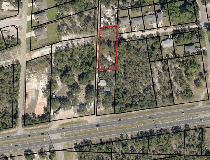 *BRING ANY & ALL OFFERS!!* Prime Development Opportunity on Hwy 98! Sale includes approximately 0.55 acres from the rear portion of the parcel at 5104 Gulf Breeze Parkway. This cleared, partially fenced land features a 12' x18' workshop and is zoned HCD/R1M allowing for a variety of residential or commercial uses. Utilities are available, and the site offers 50' of road frontage on Aqua Vista Drive as well as excellent ingress/egress with potential for Hwy 98 signage frontage. Surrounded by established rooftops and commercial users, this property is ideally located directly across from Pensacola State College and just 3 miles east of Walmart, Lowe's, and Publix. Convenient access to I-10 via Avalon Blvd or the Garcon Point Bridge, and only minutes to Pensacola or Navarre Beach. Whether yo u're looking to develop, expand a business footprint, or invest in high-traffic land, this parcel offers both visibility and versatility in one of Gulf Breeze's most strategic locations. Legal description and parcel ID to be updated upon completion of new survey.