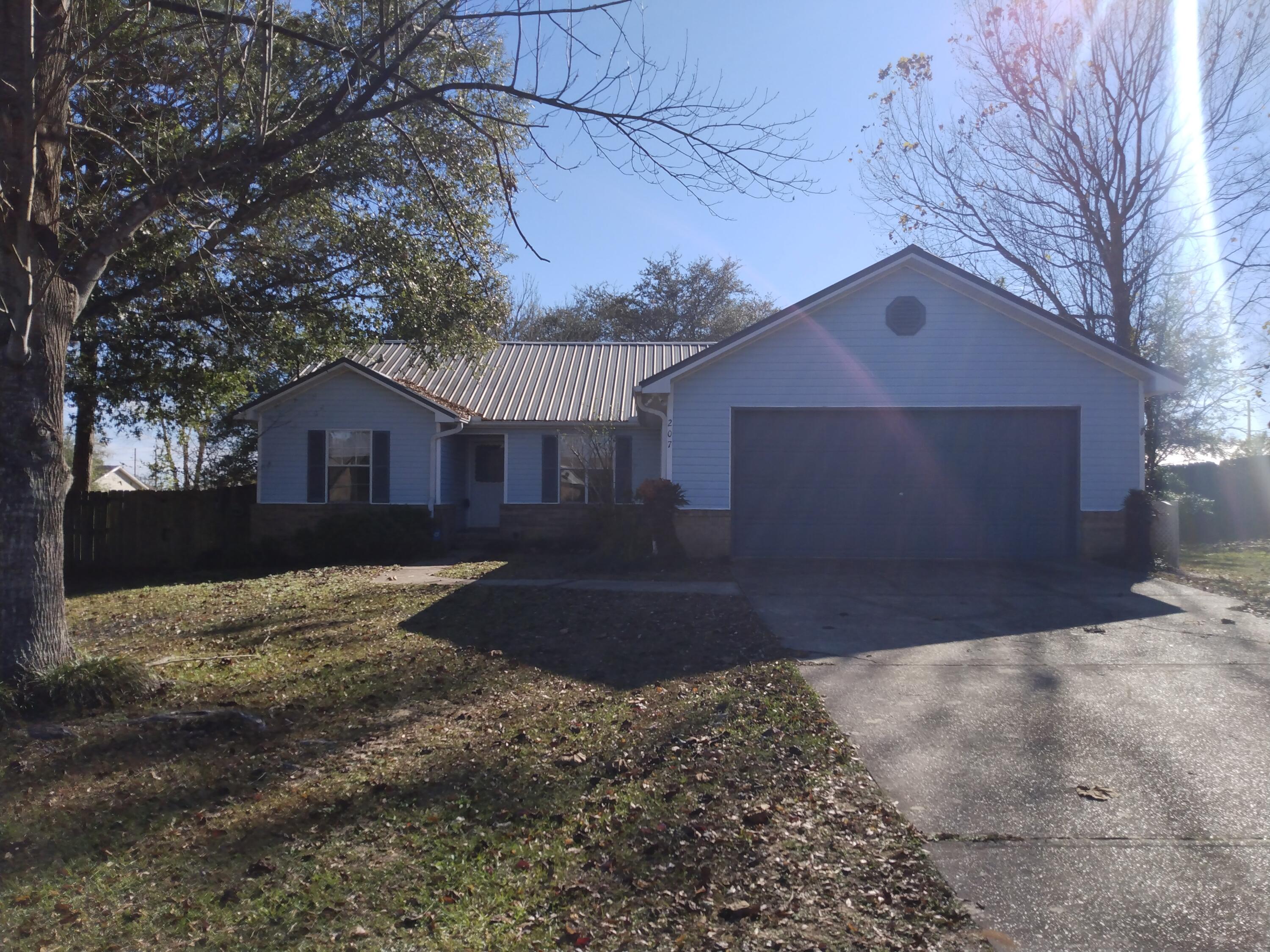 GREAT LOCATION, S OF I-10, CLOSE TO DUKE FIELD & SPECIAL FORCES COMPLEX, SHOPPING, BEACHES ETC. 4br/2bath, 1634sf home newly painted and new luxury Vinyl Plank flooring throughout. Warm & inviting- enter into the large open living area with cathedral ceiling, new  & wood-burning fireplace. The cook can be a part of everything going on with this galley kitchen with open wall to dining & family room. Split bedroom design with a fourth bedroom just off the master bedroom that would be great as an office, study or nursery which can be entered from master bedroom/bath or hallway. Florida room (10x24) added for more enjoyment. Privacy-fenced back yard with two metal yard/storage buildings. Call for appointment.