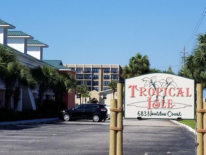 Back on Market!! The Best Kept Secret of Okaloosa Island. Just steps away from direct beach access. This cozy 1 bedroom property has been recently updated, newer stove, microwave, garbage disposal, dishwasher, water tank. The furniture has recently been replaced as well as fresh paint in 2019.  The location is about 150 feet from the beach access walkover to the white beach sand of the Gulf of Mexico. It is perfect for a second home and also rents quite well. The current owner self manages the property. Tropical Isle has a private pool with plenty of patio furniture for use. An onsite laundry is handy for guests, so no worries there. There is plenty of gust parking as well. The location is close to a number of local restaurants, and activities so take a look now before it is gone.