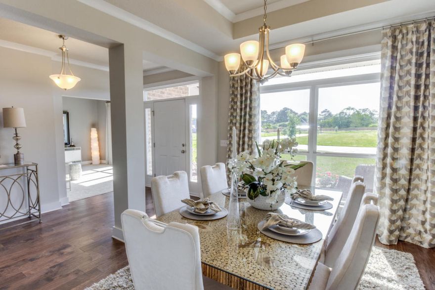 VA approved builder. The McKenzie w/ newly designed kitchen. 5 bedrooms & 3 baths, this home has covered front & back porches w/ side entry corner lot. Foyer divides the study from the formal dining rm. An elegant kitchen featuring an island, granite counters, stainless range, microwave & dishwasher complete this space. Large walk-in closet is a plus! In the master bath you will find dual sinks, garden tub & fiberglass 5 foot shower. Listing Broker/Salesperson has ownership interest in the property. Pictures, photographs, colors, features & sizes are for illustration purposes only & will vary from the homes as built. Home & community information including pricing, included features, terms, availability & amenities are subject to change & prior sale at any time without notice or obligation.