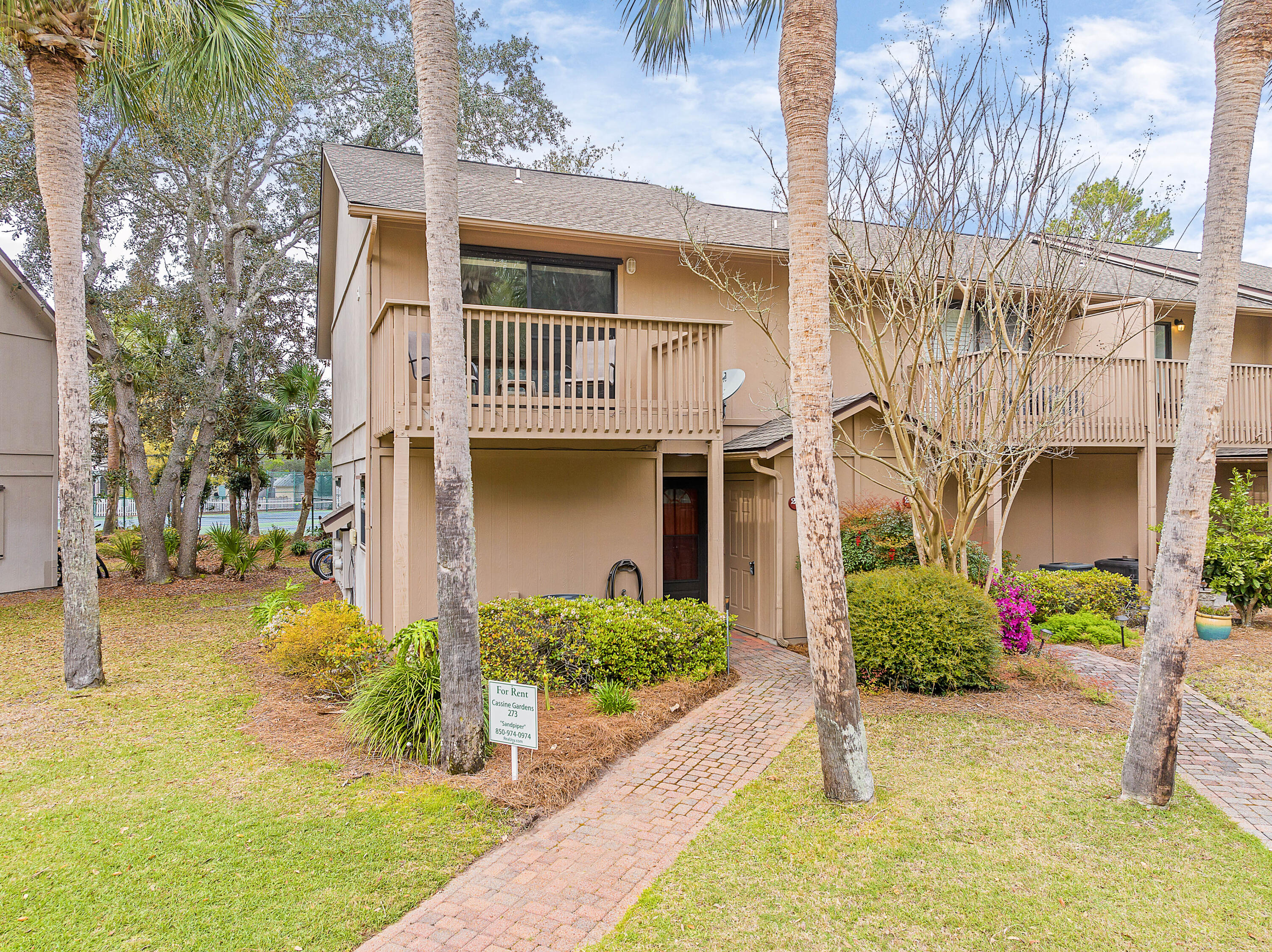 Welcome to your new home in Seagrove Beach's charming Cassine Gardens! Enjoy the upgrades of an end unit in this well-maintained townhome, offering both privacy and tranquility. Submerge yourself in the luxury of two private balconies, accessible from each bedroom, perfect for enjoying your morning coffee or relaxing with a glass of wine. Each bedroom has a private full bath, with an additional half bath on the first floor for ease of access. This unit is just moments away from a variety of restaurants and boutique shops, as well as easy access to one of Seagrove Beach's largest public beaches, inviting you to soak up the sun and sea. Within Cassine Gardens, residents have access to amenities such as two inviting pools, a picnic area with a grill, tennis/pickleball courts, stunning trails  and a pool bathroom that is accessible from the public beach access, offering endless opportunities for leisure and recreation. This turnkey townhome provides a seamless transition into coastal living along 30A's pristine beaches or choose to utilize this unit as a vacation rental property. Multiple updates have been made in the last few years including a new stove, washing machine, TVs, patio tile, and a new storm door, which make this town house a lucrative investment.