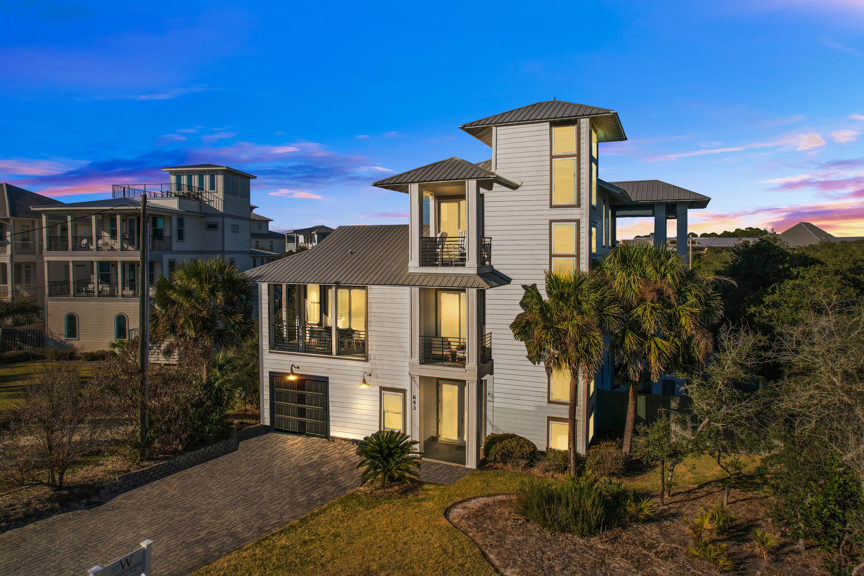 Located in highly touted Blue Mountain Beach, this contemporary beach house has superb gulf views right across the street from the white sandy beach. With over $200K in annual gross rentals this home is a powerhouse in Blue Mountain Beach. Completely renovated in 2022, it has ample room to expand in the oversized backyard. This peaceful private haven is in a quiet street and has its own heated pool, spa tub, outdoor shower and sprinkler system. There's even a surround sound system for listening to your own playlist while relaxing by the pool. Multiple balconies and private terraces abound on all three levels. They provide quiet nooks so that everyone can enjoy their own private space. Inside, this beautiful home has all the bells and whistles.